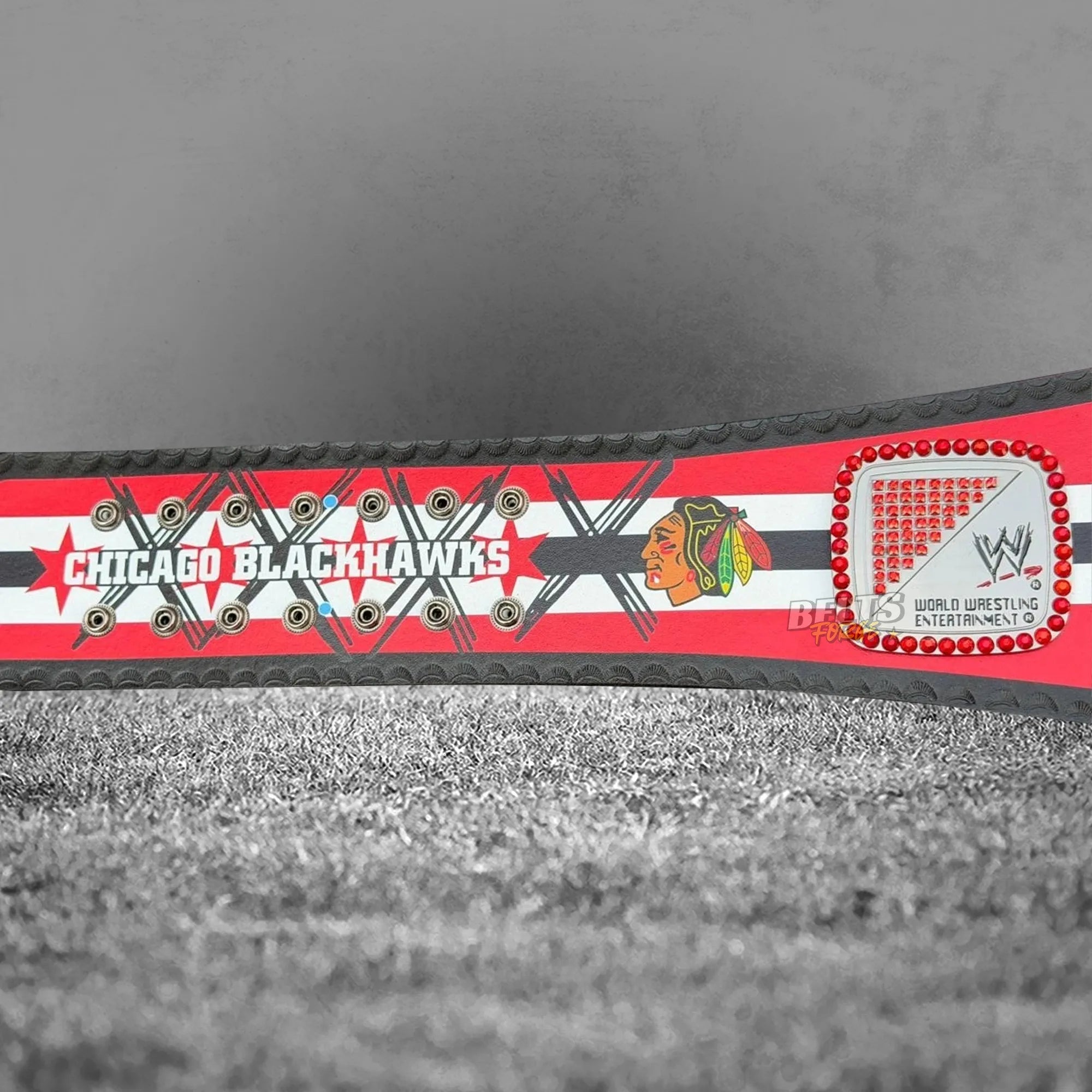 CM Punk Championship Belt center plate close-up showing Punk x Lightning Fist logo design