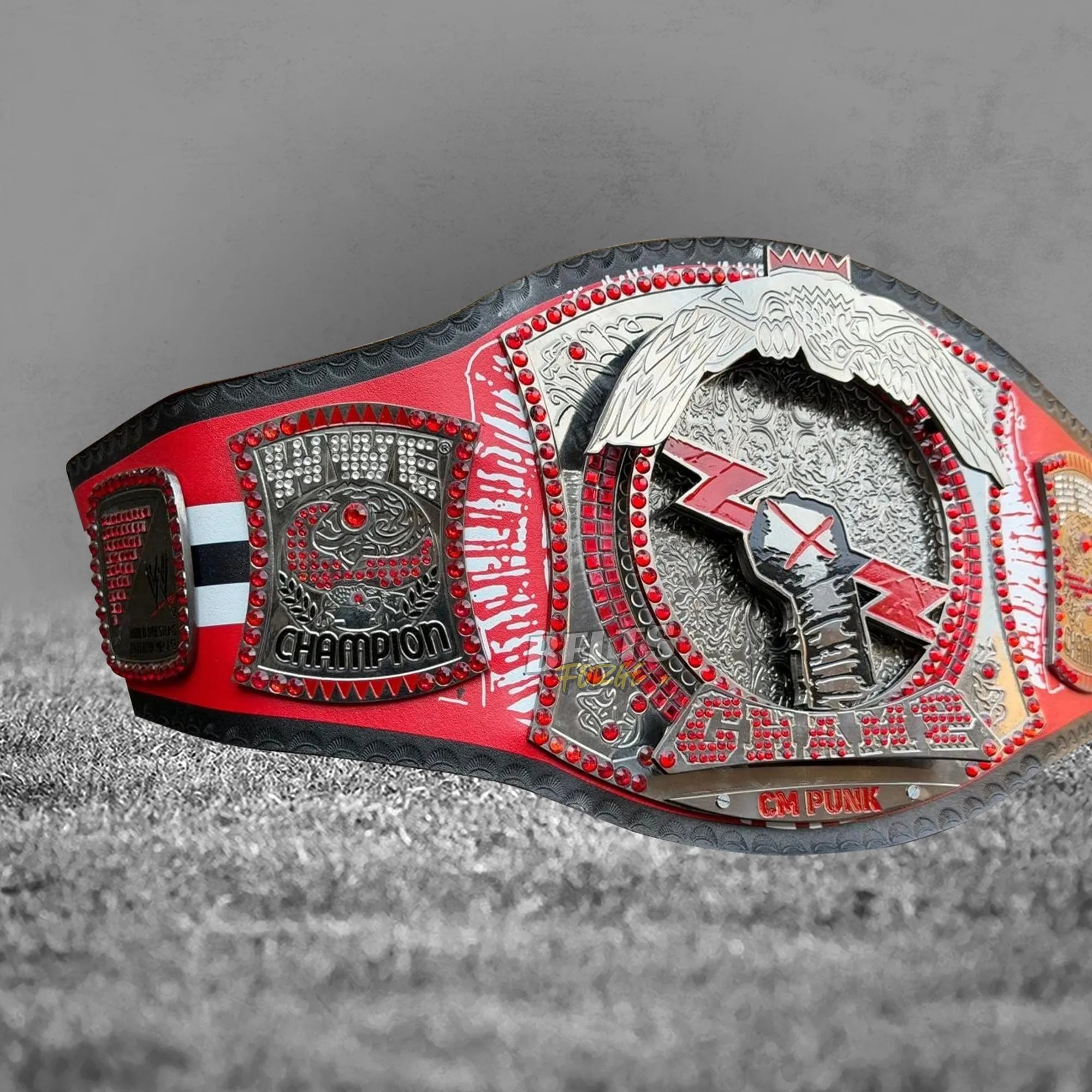 CM Punk Championship Belt full flat lay showing Chicago Blackhawks strap design and gold-plated plates