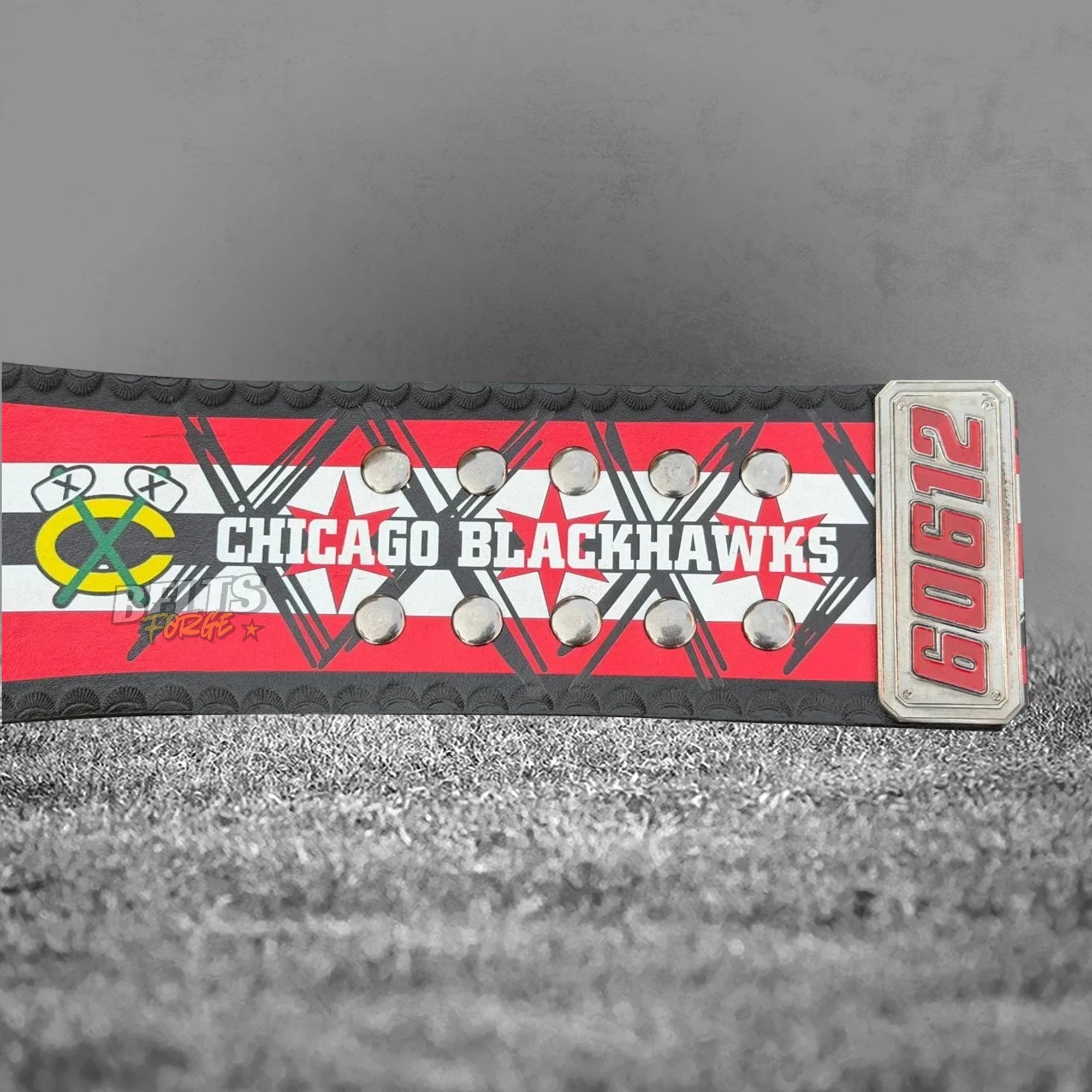 CM Punk Championship Belt right strap showing Champion side plate and Chicago Blackhawks strap detail