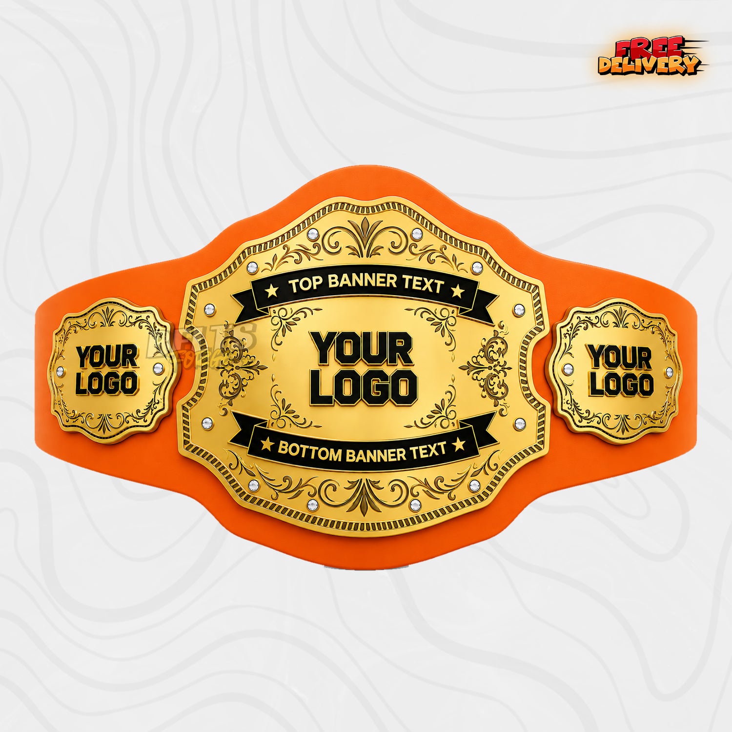 Custom Gold Filigree Banner Championship Belt in orange genuine leather strap showing solid gold oval logo plate with custom banner text