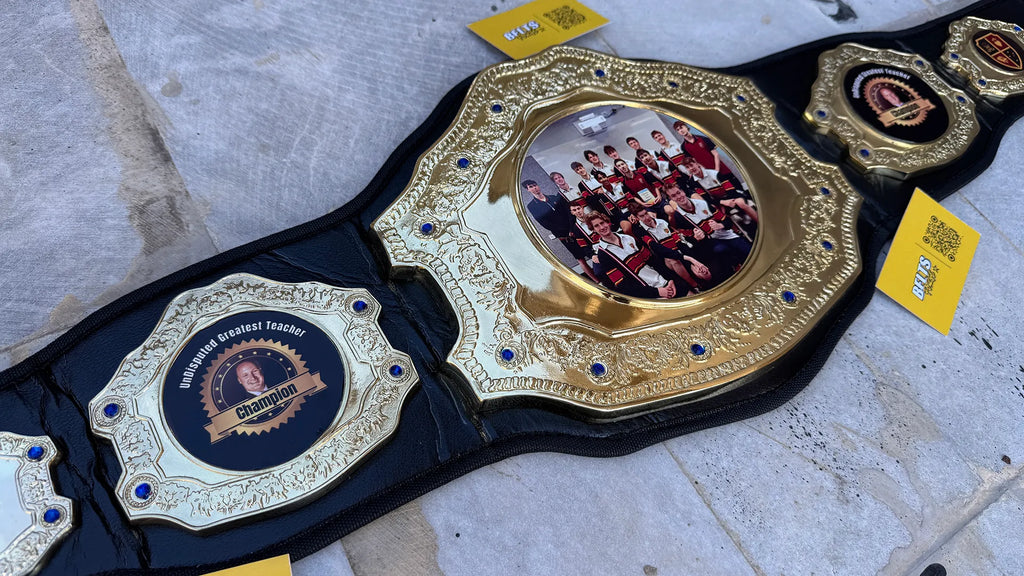 Custom Greatest Teacher Championship Belt left angled teacher champion side plate close up