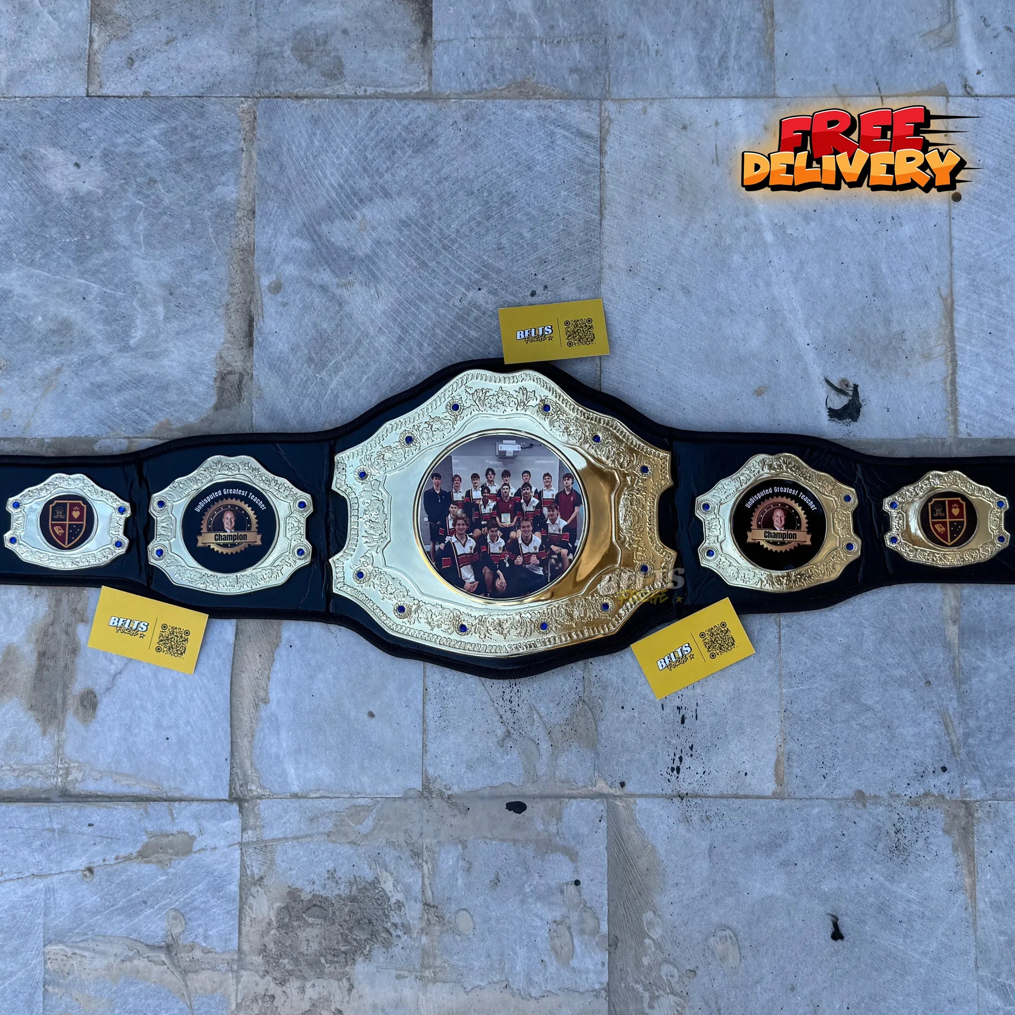 Custom Greatest Teacher Championship Belt die cast 5 plate promotional front view flat lay by Belts Forge