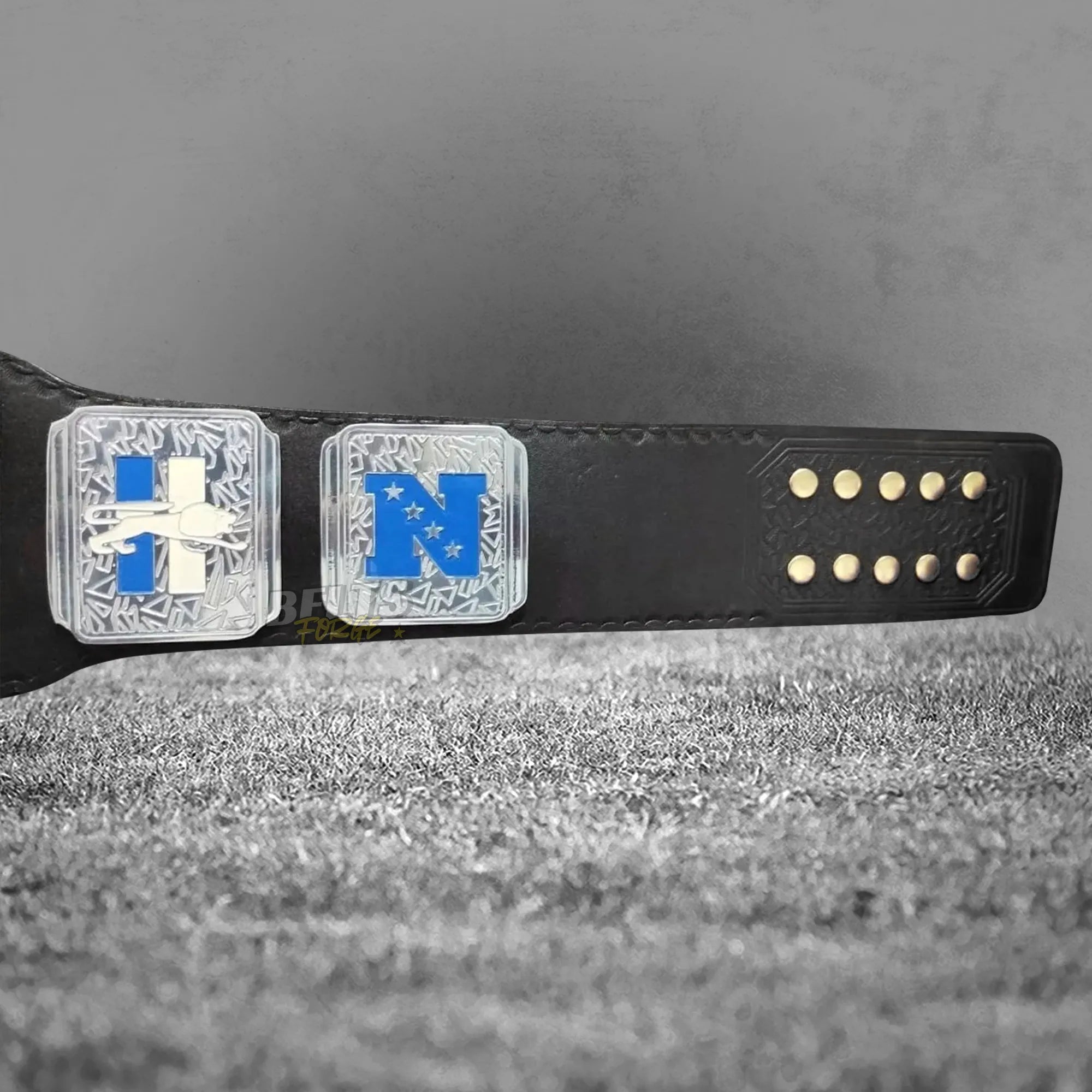Detroit Lions championship belt NFC plates and strap detail showing gold hardware on Honolulu blue Lions printed leather