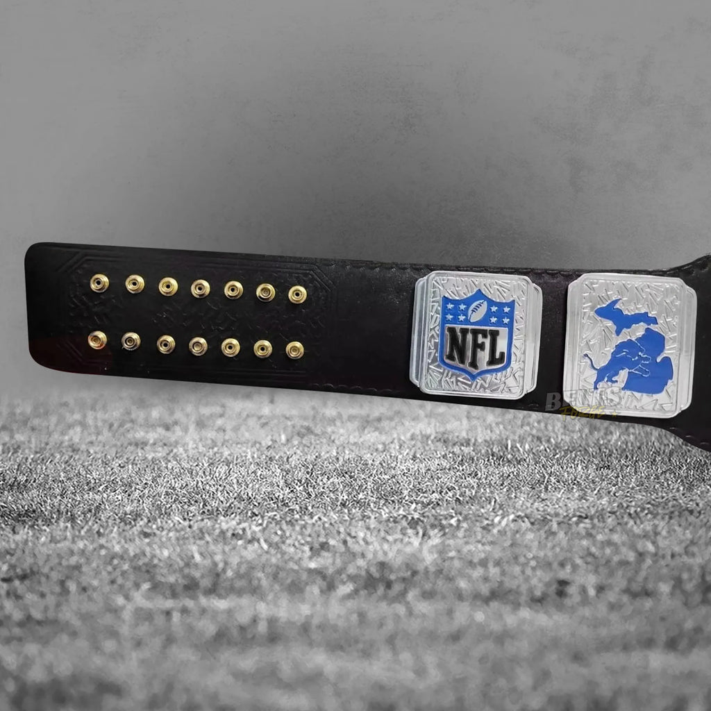 Detroit Lions championship belt strap rivet and plate detail showing gold hardware on genuine Honolulu blue printed leather