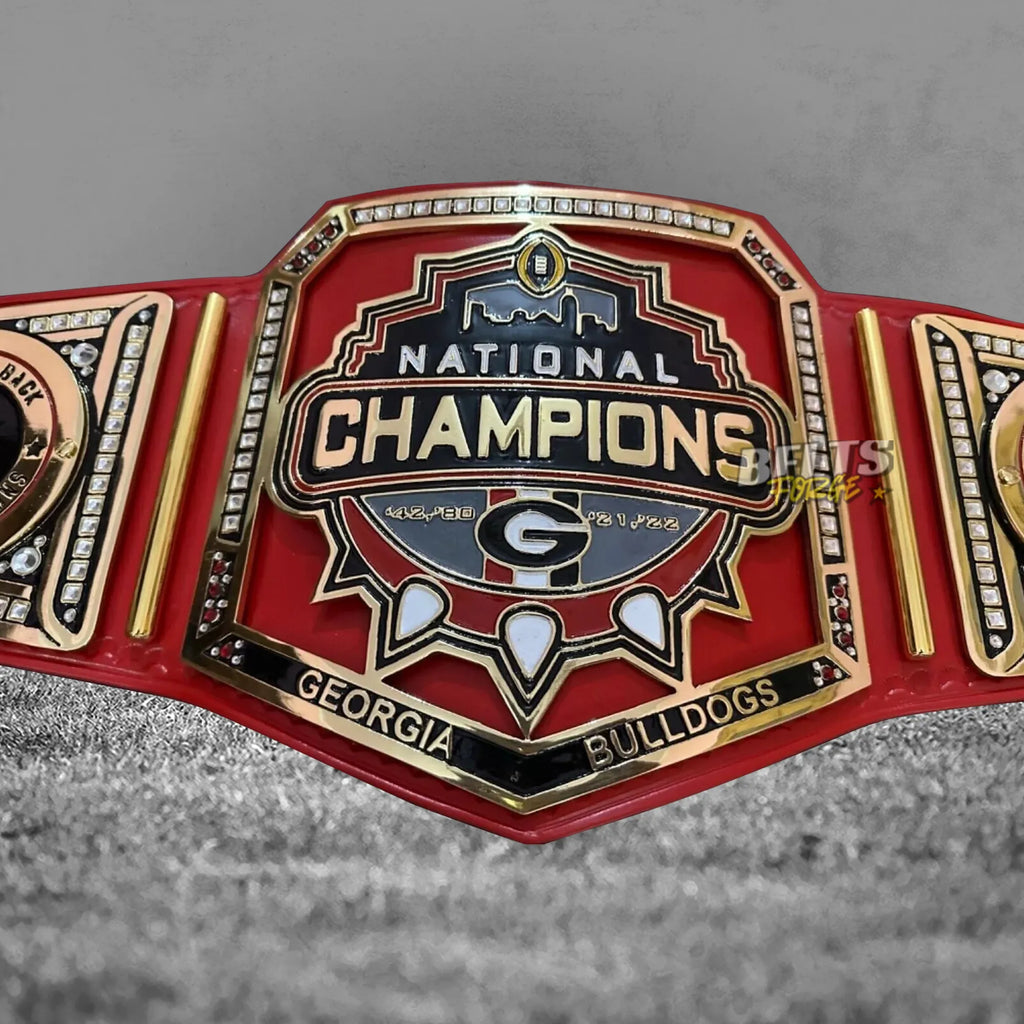 Georgia Bulldogs championship belt center plate close-up showing CNC engineered gold-plated brass Bulldogs design
