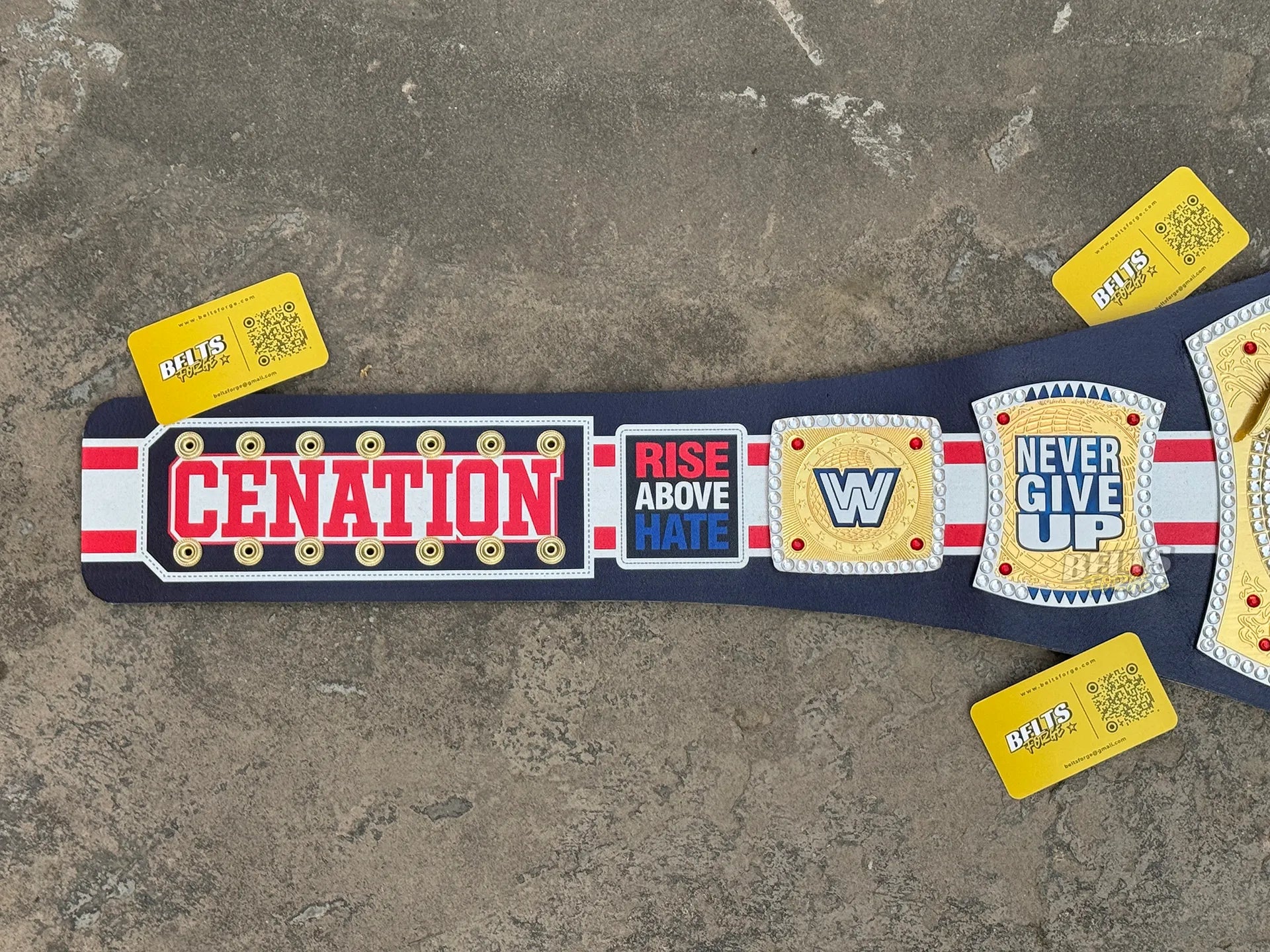 John Cena Farewell Tour Chicago 2025 Belt left strap showing Cenation Rise Above Hate and Never Give Up detail