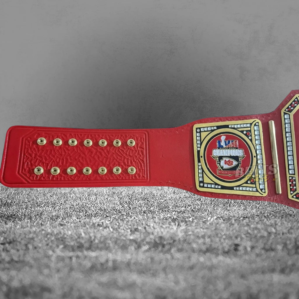 Kansas City Chiefs championship belt strap rivet and AFC side plate view showing gold hardware on genuine red printed leather