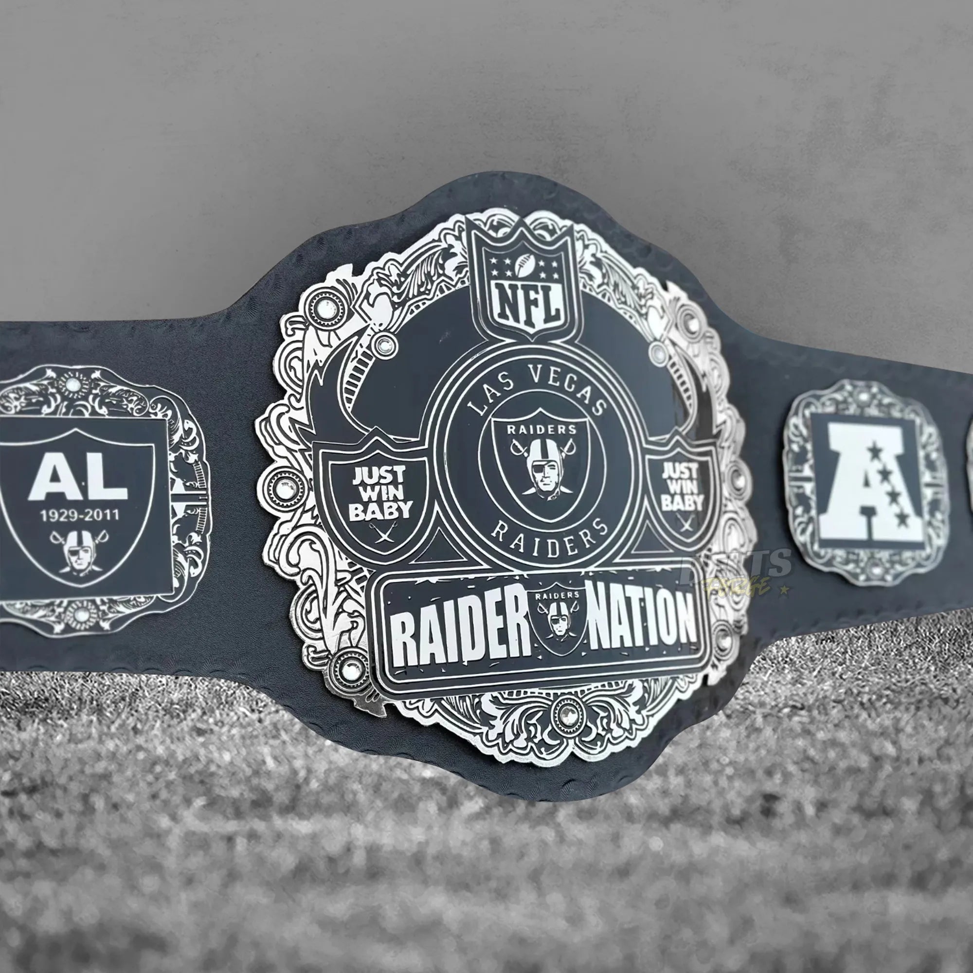 Las Vegas Raiders Championship Belt front display view showing full silver finish on genuine leather strap