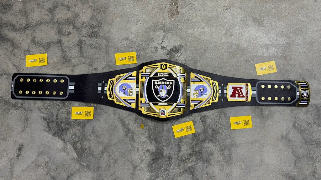 Las Vegas Raiders WWE Legacy Championship Belt replica full view, gold Raiders shield plates and AFC West side plates on black strap