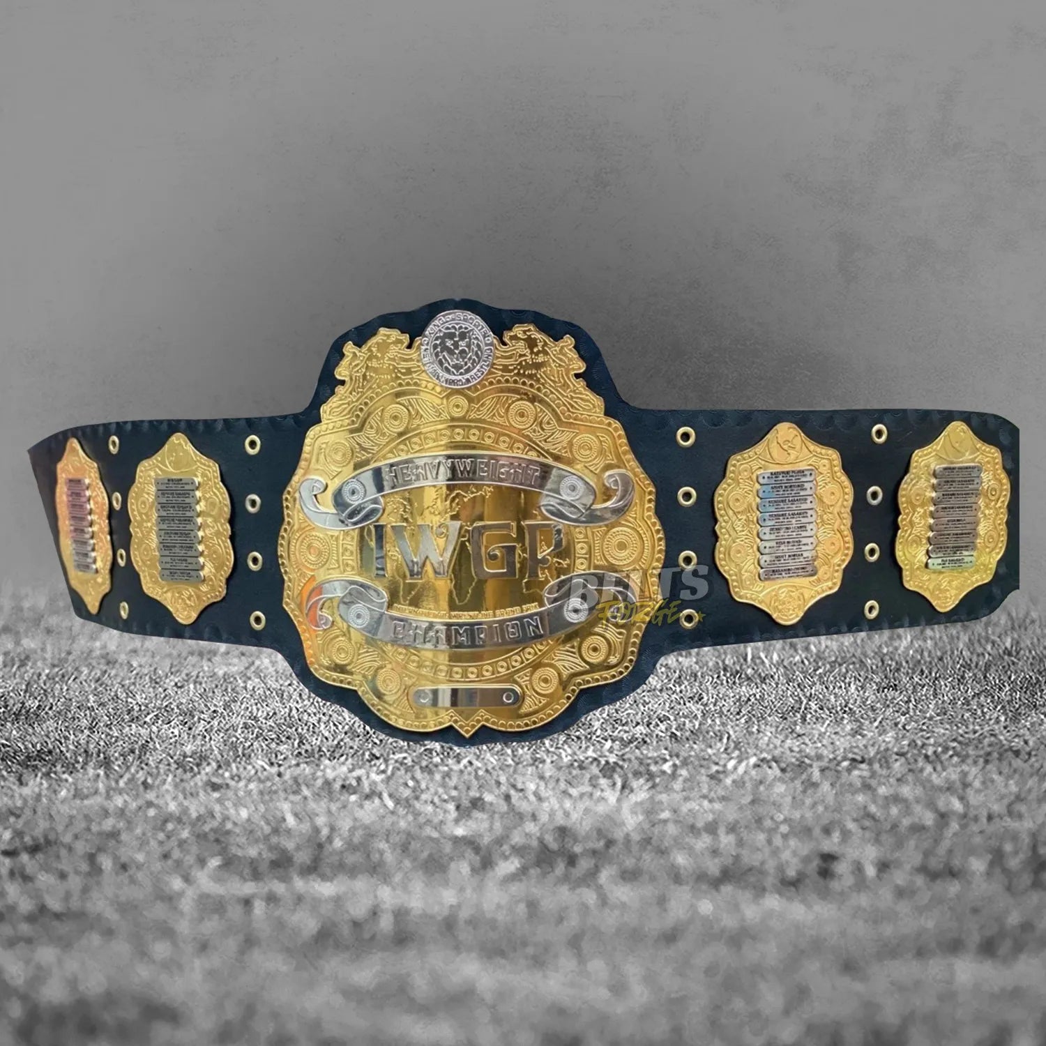 NJPW IWGP Heavyweight Championship Classic Belt front view, gold-plated brass main plate on genuine black leather strap