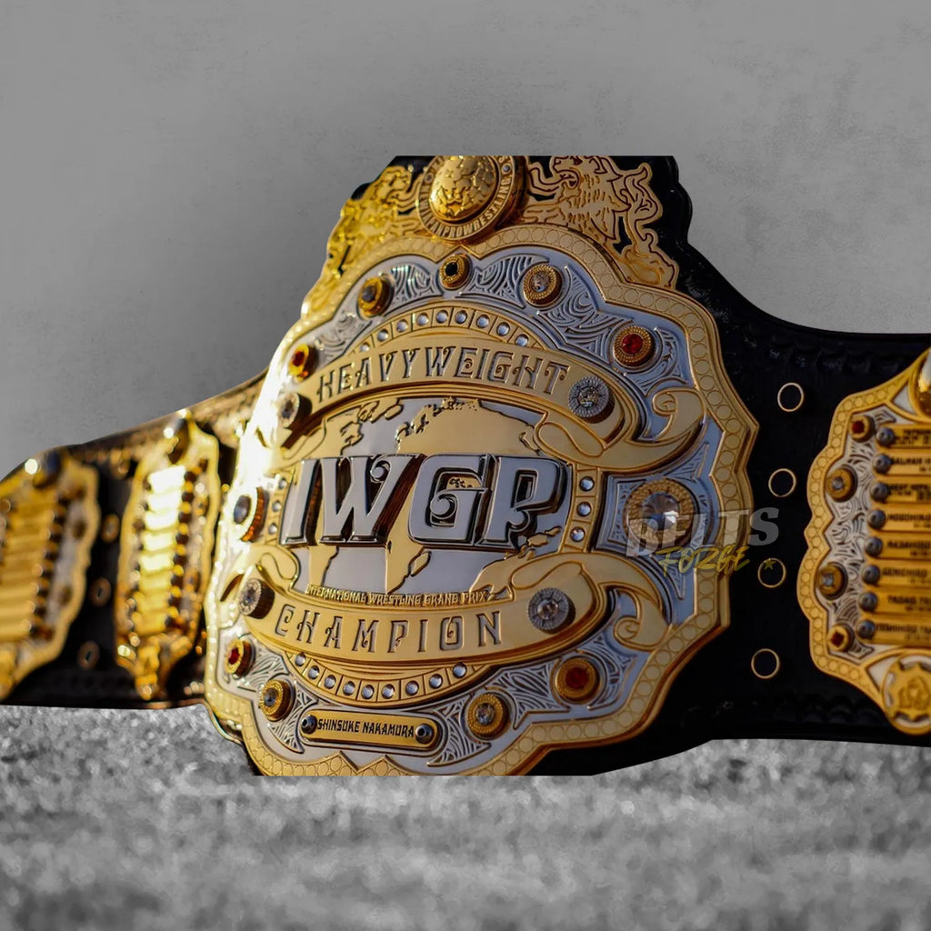 IWGP Heavyweight Championship V4 Belt center plate front view showing Nakamura era nameplate on gold-plated brass