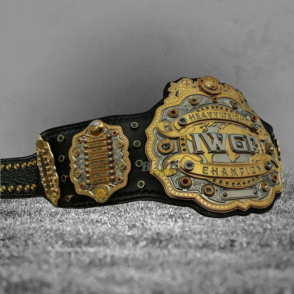 IWGP Heavyweight Championship V4 Belt left side plate and strap angled view showing gold-plated brass and genuine leather