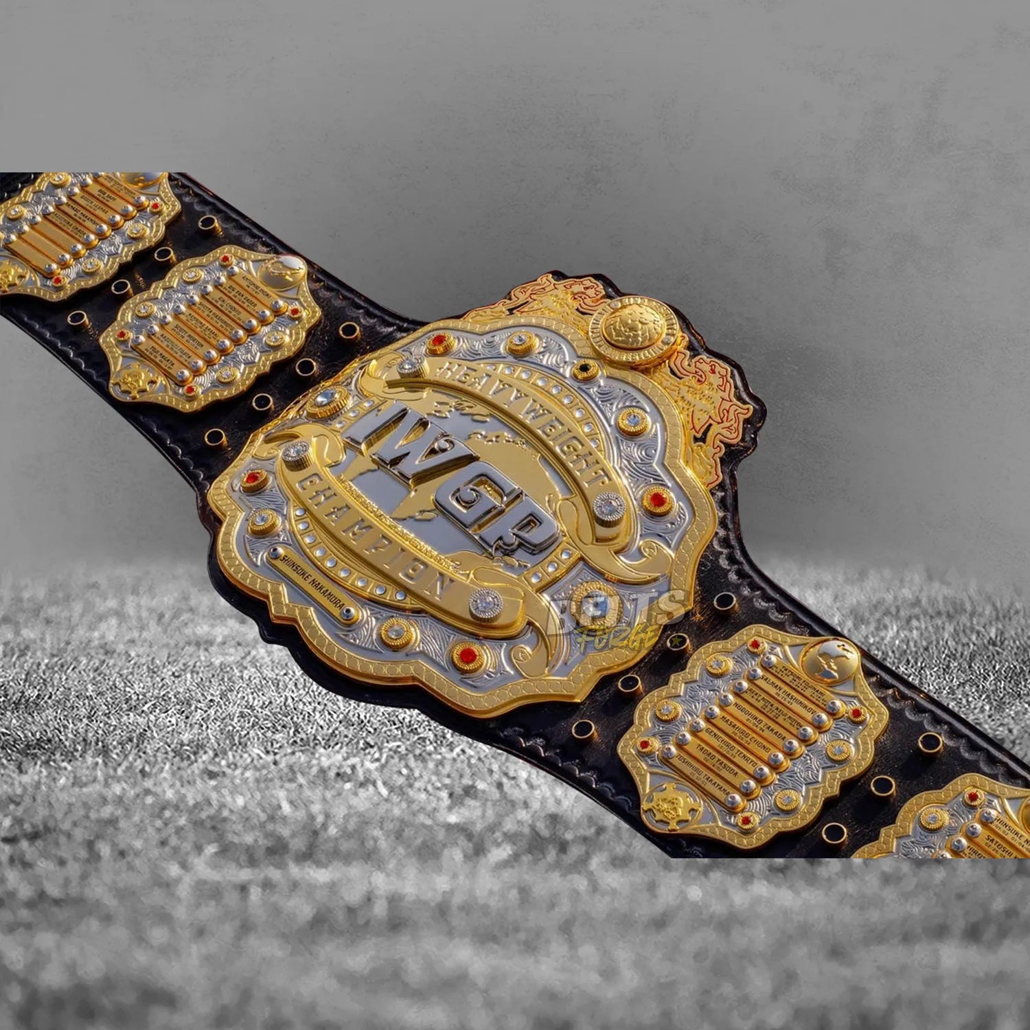 IWGP Heavyweight Championship V4 Belt overhead display view showing all plates with Nakamura nameplate and champions list