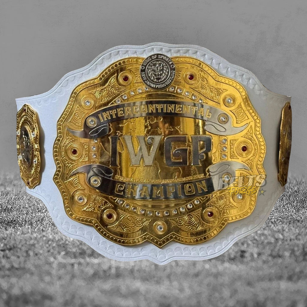 NJPW IWGP Intercontinental Championship Belt center plate close-up showing CNC-engraved gold-plated brass design on white leather