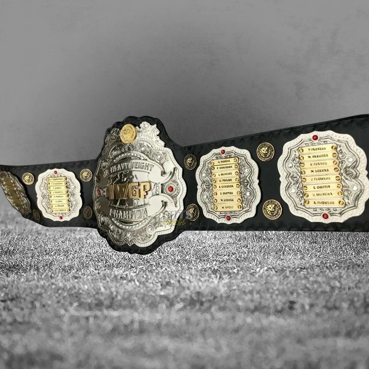 NJPW IWGP Junior Heavyweight Championship Belt angled display view right side showing gold-plated brass plates on leather strap