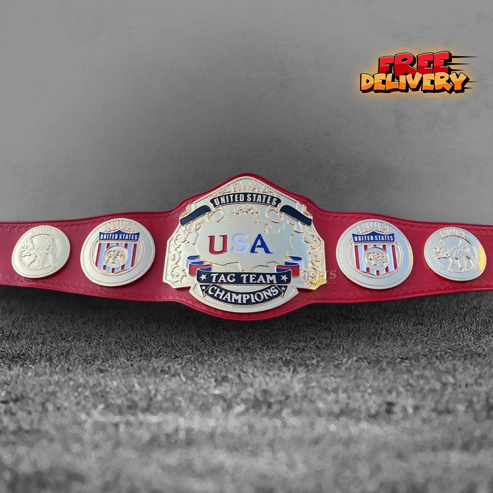 NWA USA Tag Team Championship Belt replica front view, gold-plated brass NWA globe medallion plates on genuine red leather strap by Belts Forge