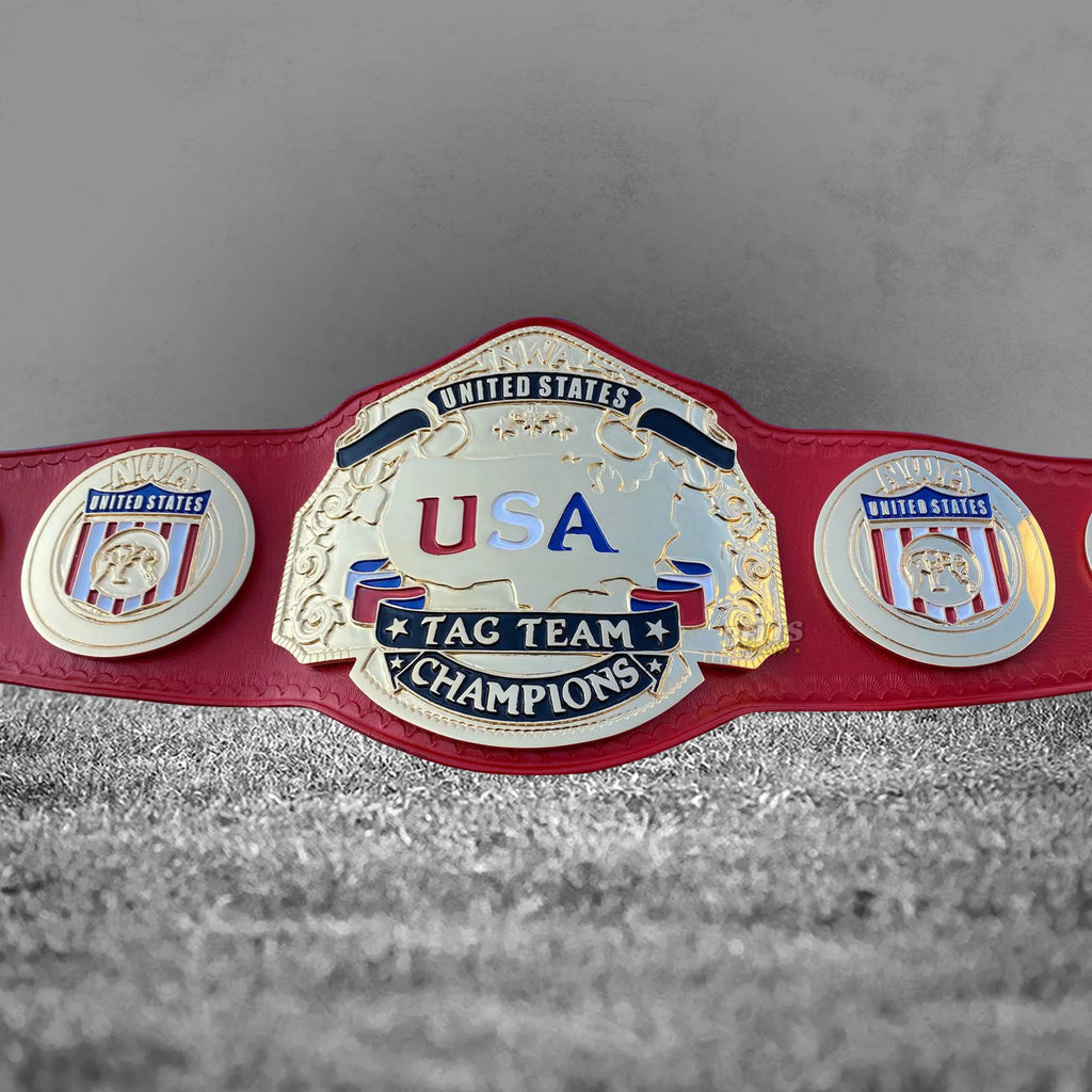 NWA USA Tag Team Championship Belt strap rivet and medallions detail showing gold-plated NWA brass medallions on genuine red leather