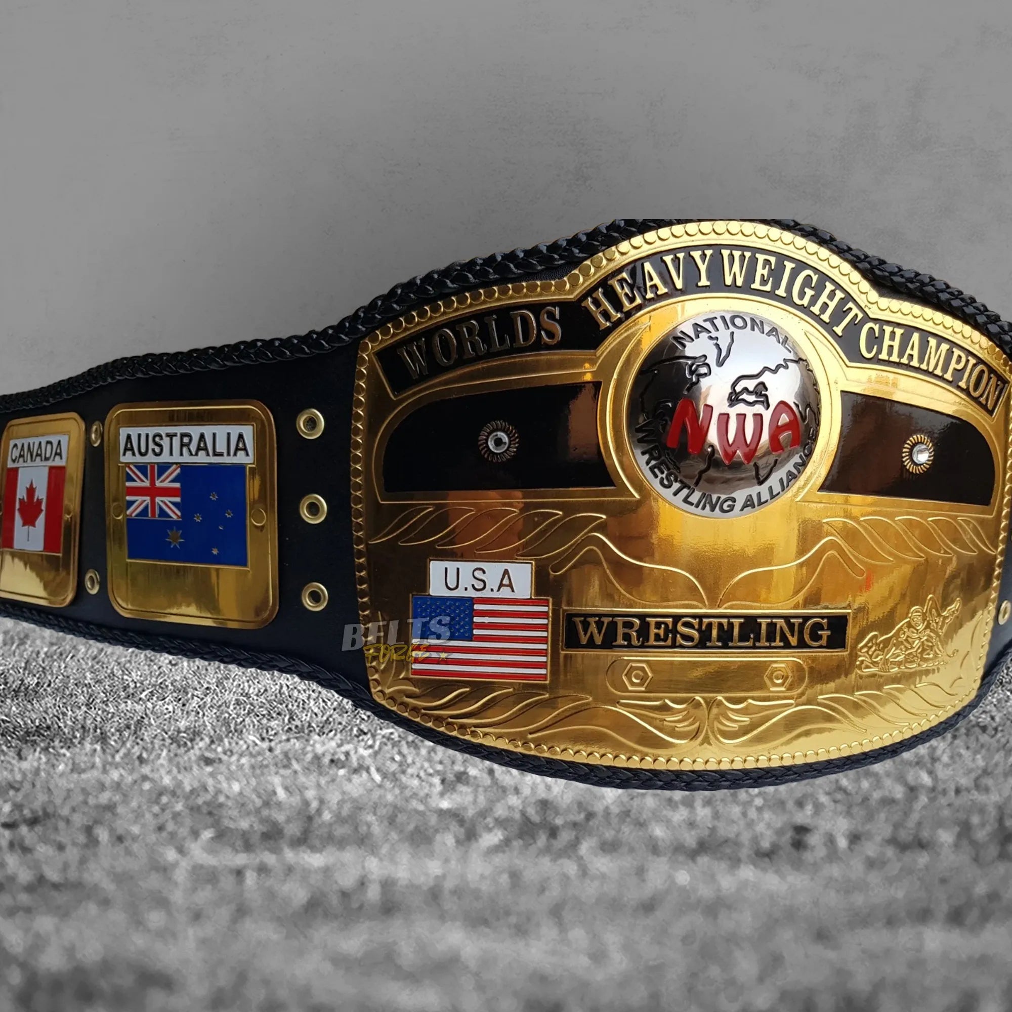 NWA World's Heavyweight Championship Belt right angled view showing center plate and Mexico and Japan flag side plates