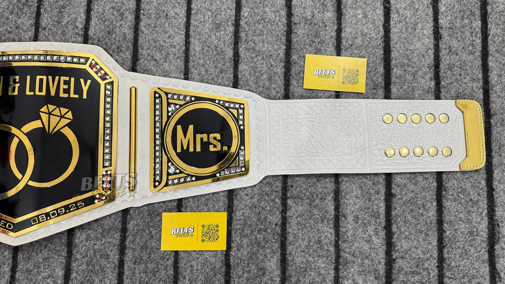 Just Married Wedding Championship Belt Mrs side plate detail showing gold-plated brass personalized Mrs plate on white leather strap