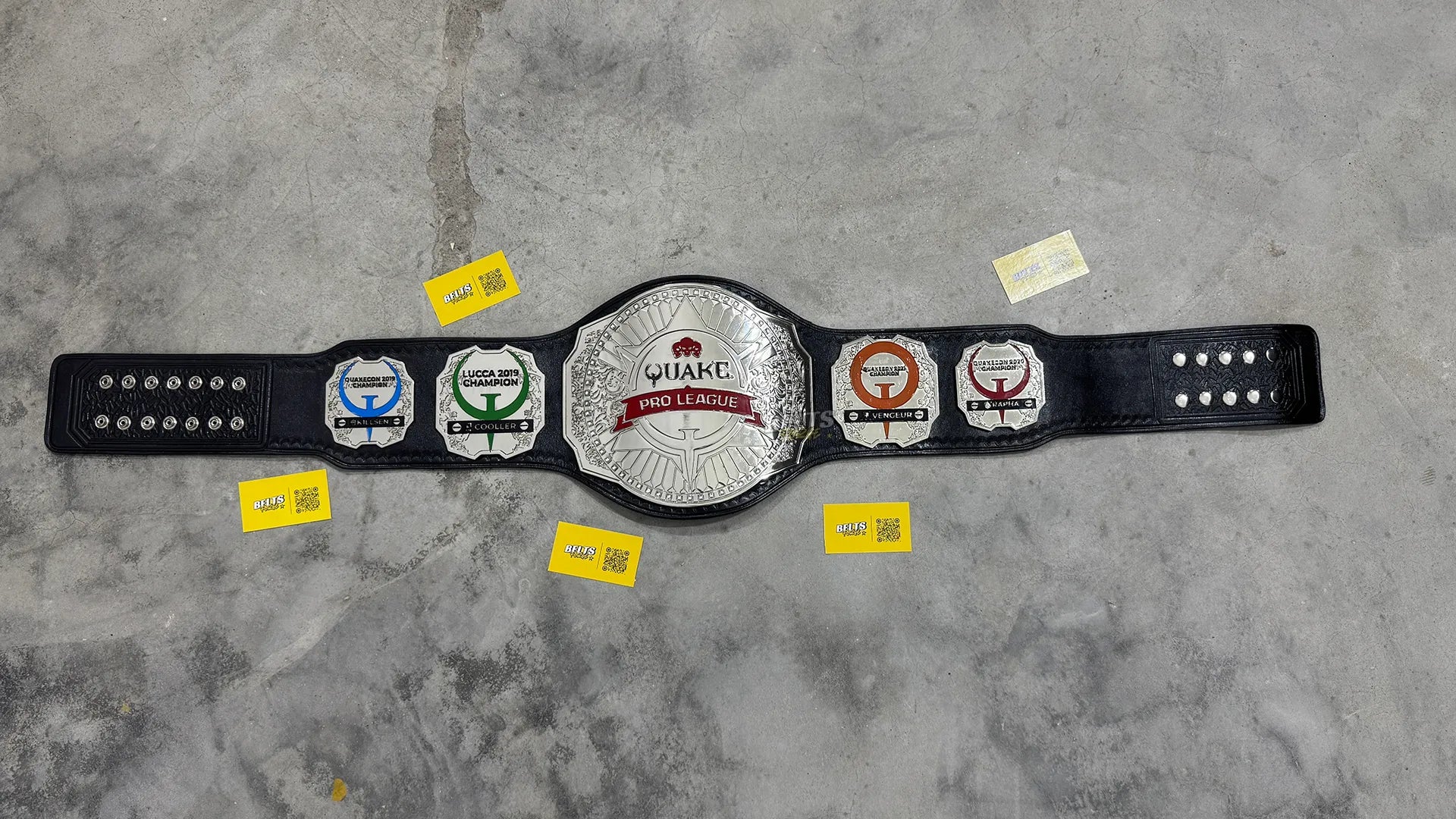 Quake Pro League Esports Championship Belt full flat lay display view showing complete silver chrome-plated plates on leather strap