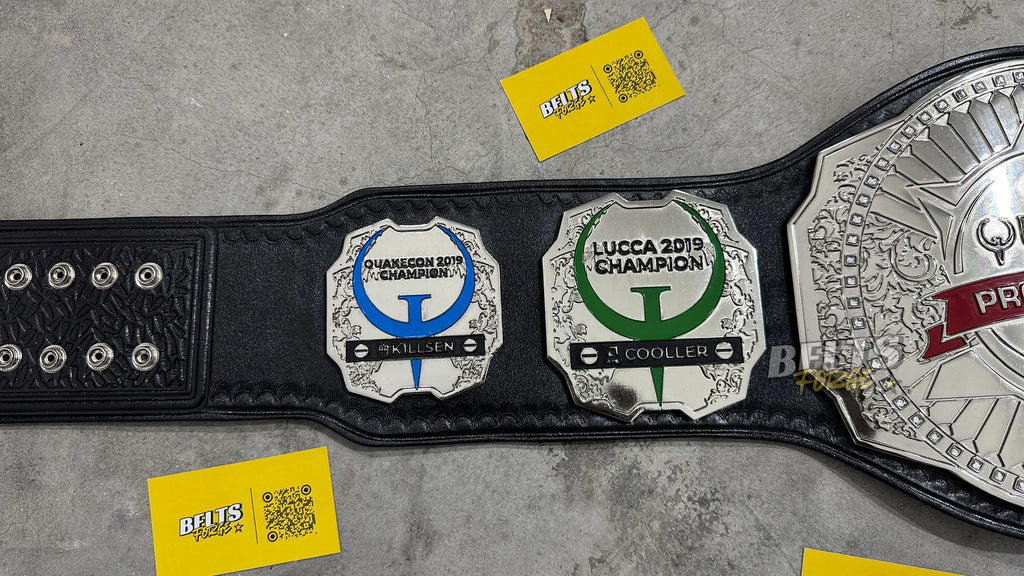 Quake Pro League Esports Championship Belt left side plate detail showing silver chrome-plated brass plate on genuine leather strap