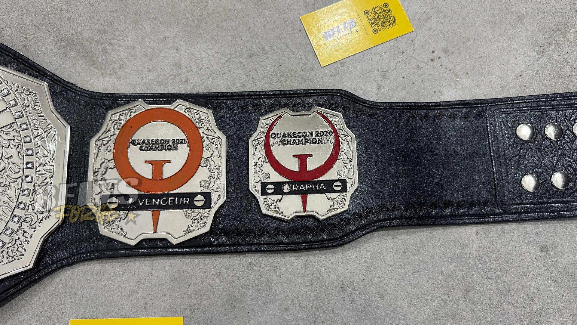 Quake Pro League Esports Championship Belt right side plate detail showing silver chrome-plated brass plate on genuine leather strap