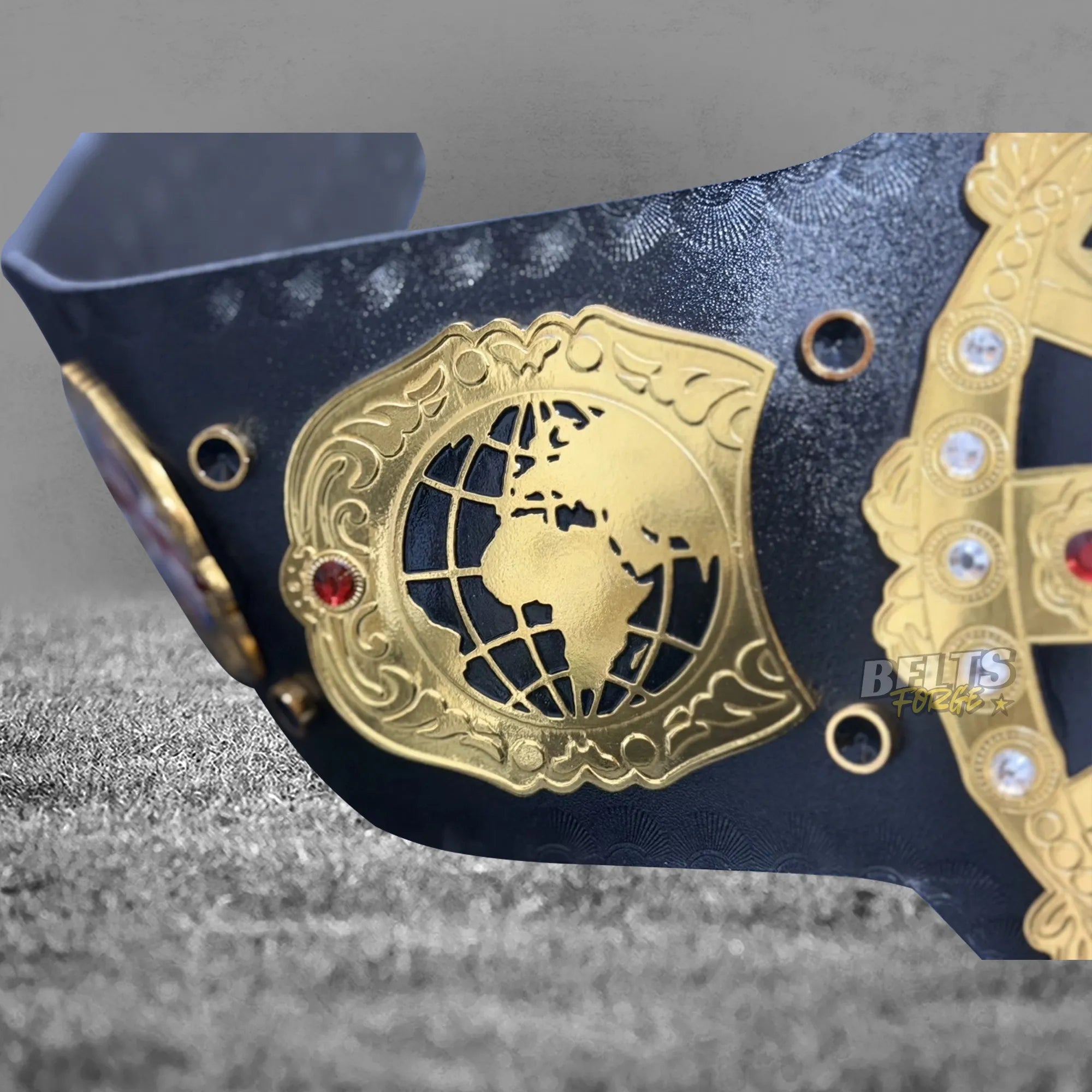 British Heavyweight Championship Belt right buckle end showing globe side plate detail on genuine leather