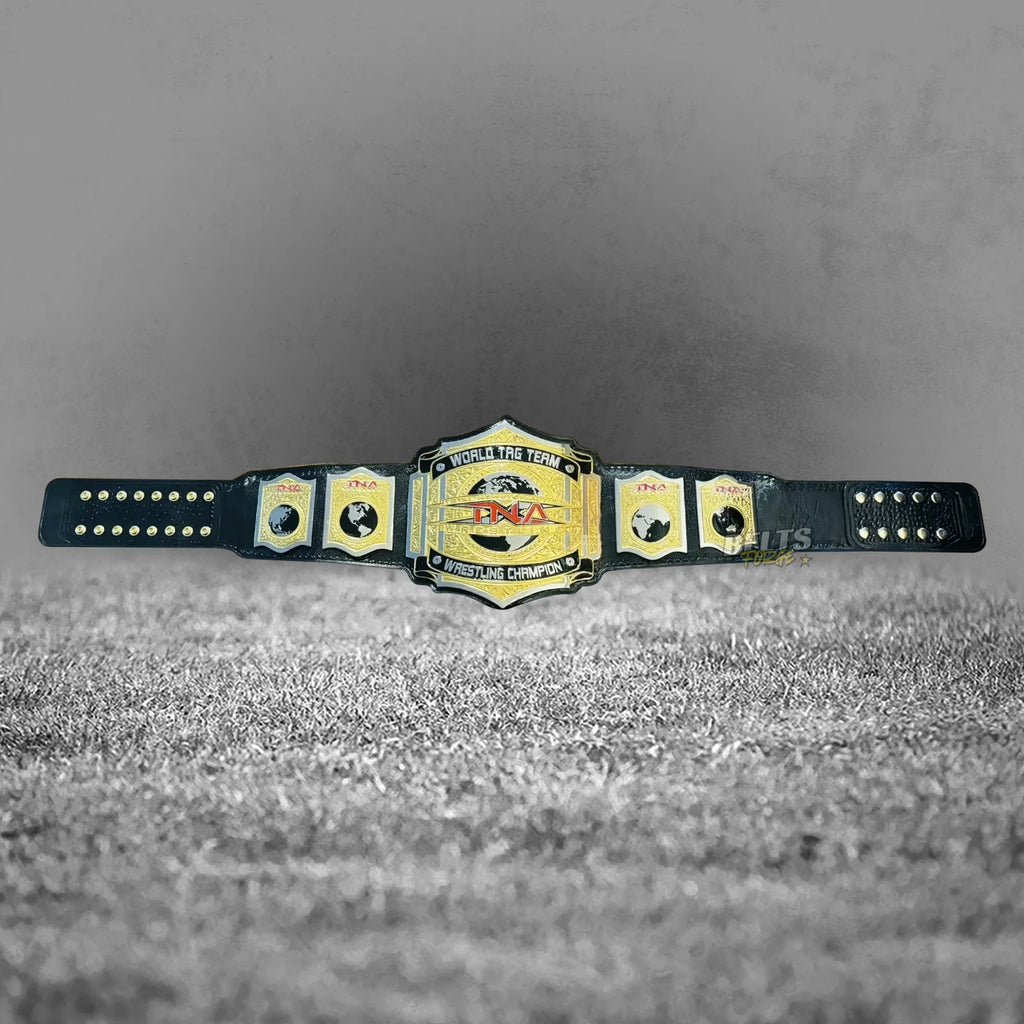 TNA World Tag Team Championship Belt side plates close-up showing gold-plated hexagonal TNA detail on leather strap