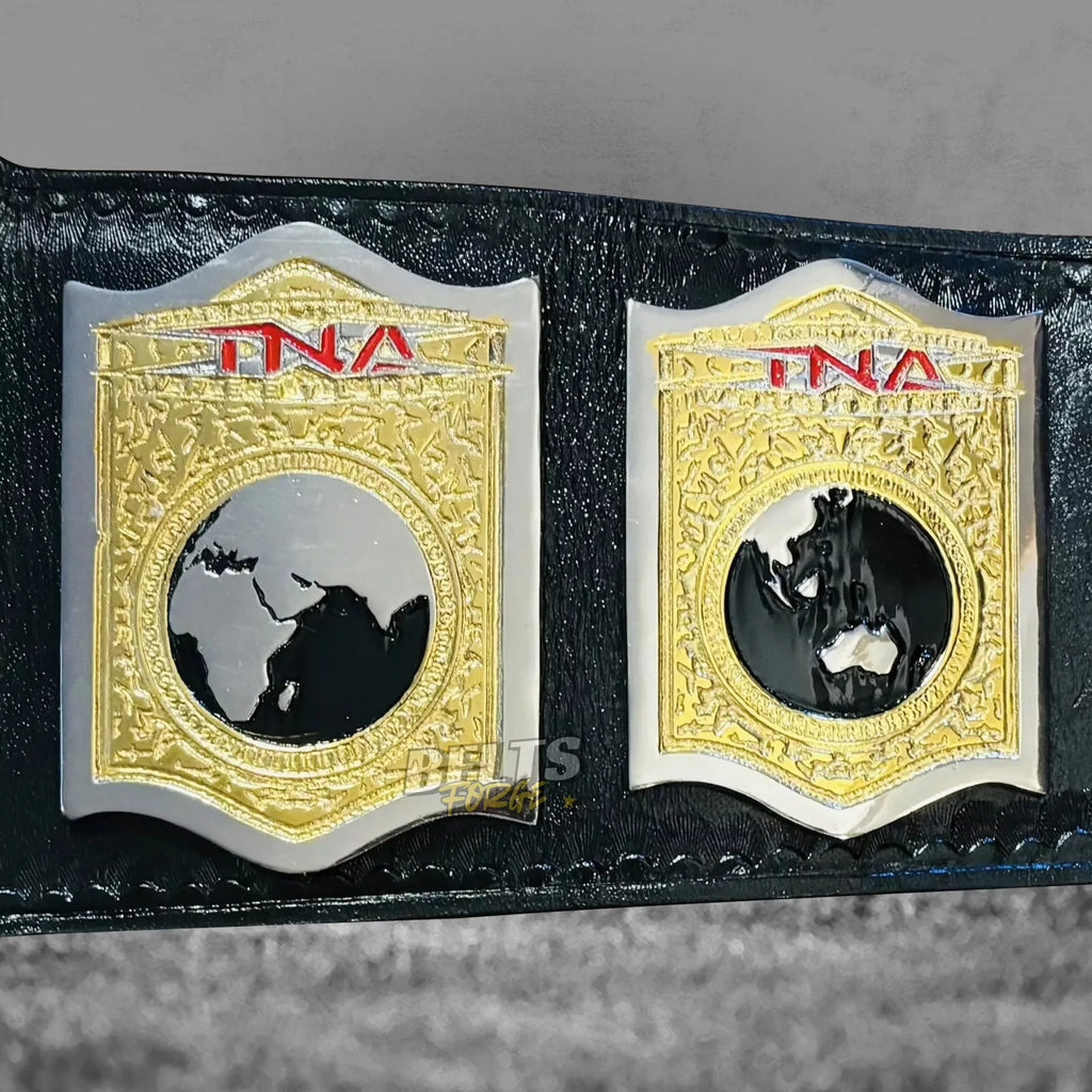 TNA World Tag Team Championship Belt strap rivet detail showing gold hardware on genuine black leather strap