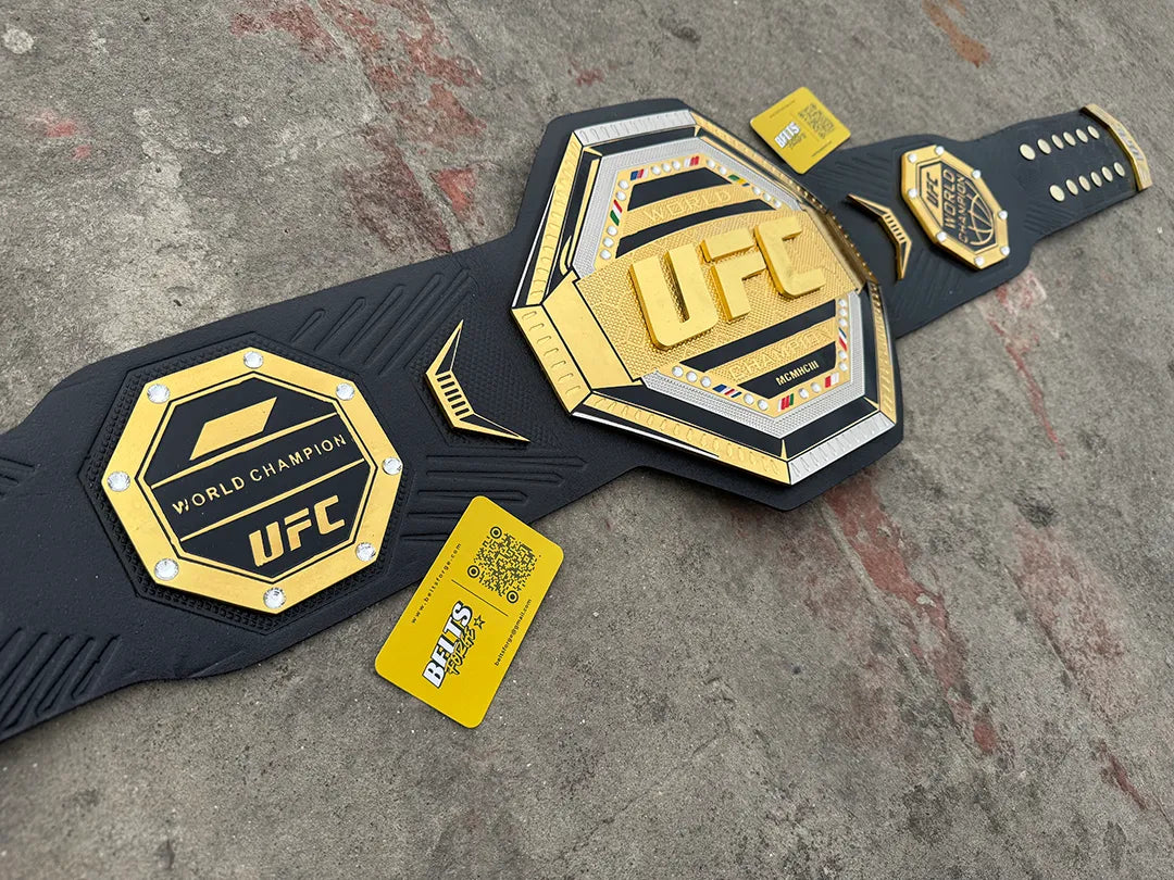UFC Legacy Championship Belt diagonal angle view, gold-plated black strap MMA fan gift and display piece