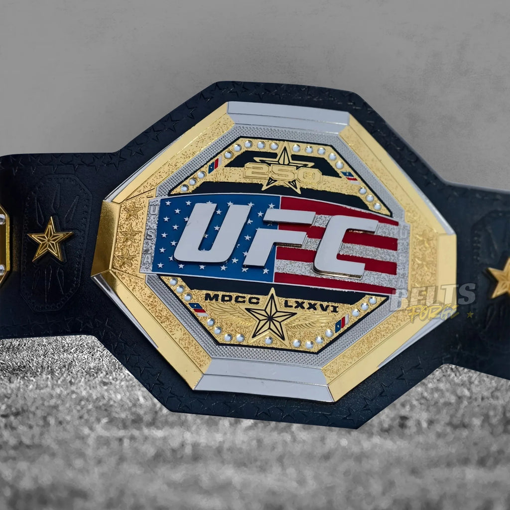 UFC Freedom 250 Championship Belt center plate close-up showing CNC-engraved gold-plated brass octagon design with crystal rhinestone border