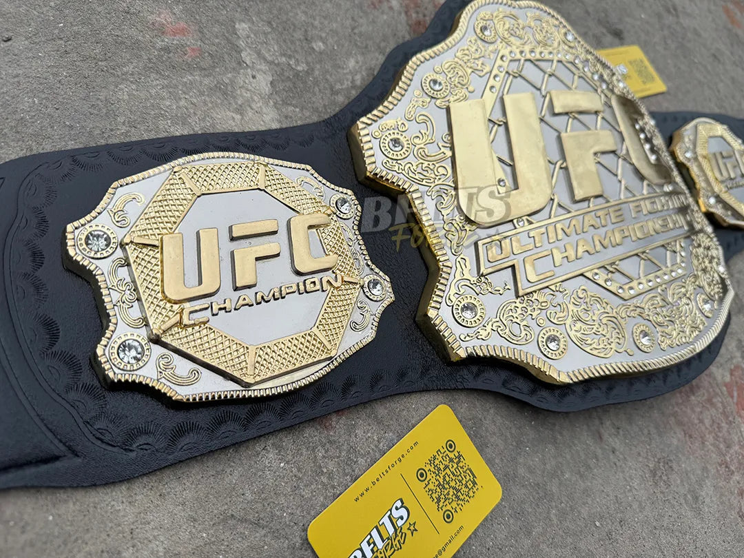 UFC Classic Championship Belt dual plate macro shot showing left side plate and center gold silver scrollwork