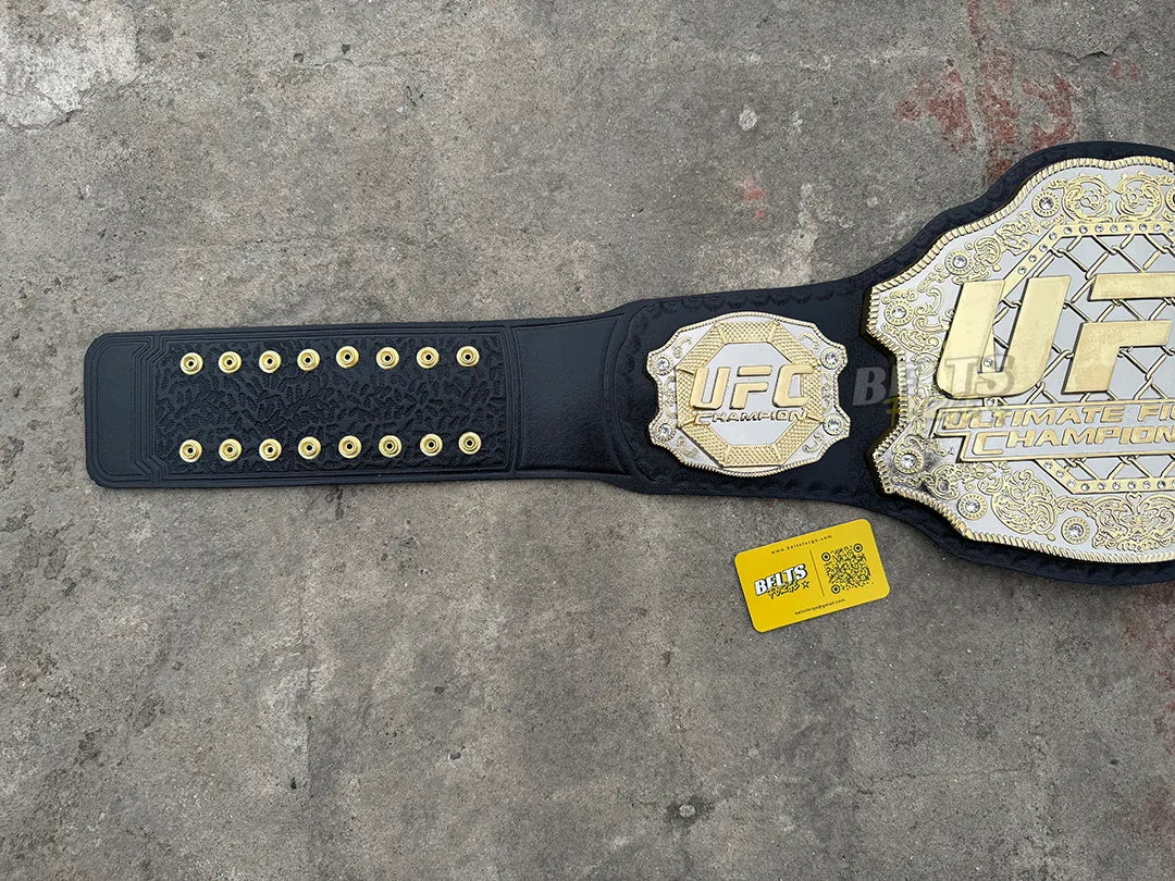 UFC Classic Championship Belt left strap showing gold dome studs, side plate detail and black leather texture