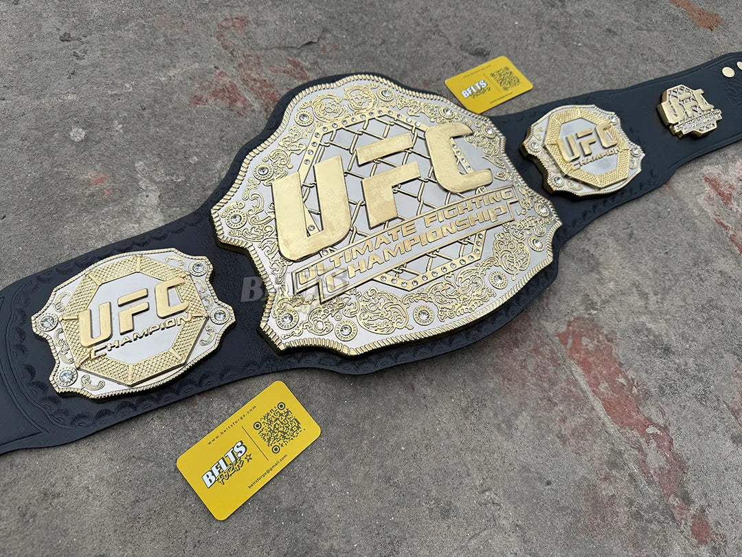 UFC Classic Championship Belt diagonal beauty shot, silver and gold scrollwork plates on black MMA collector display