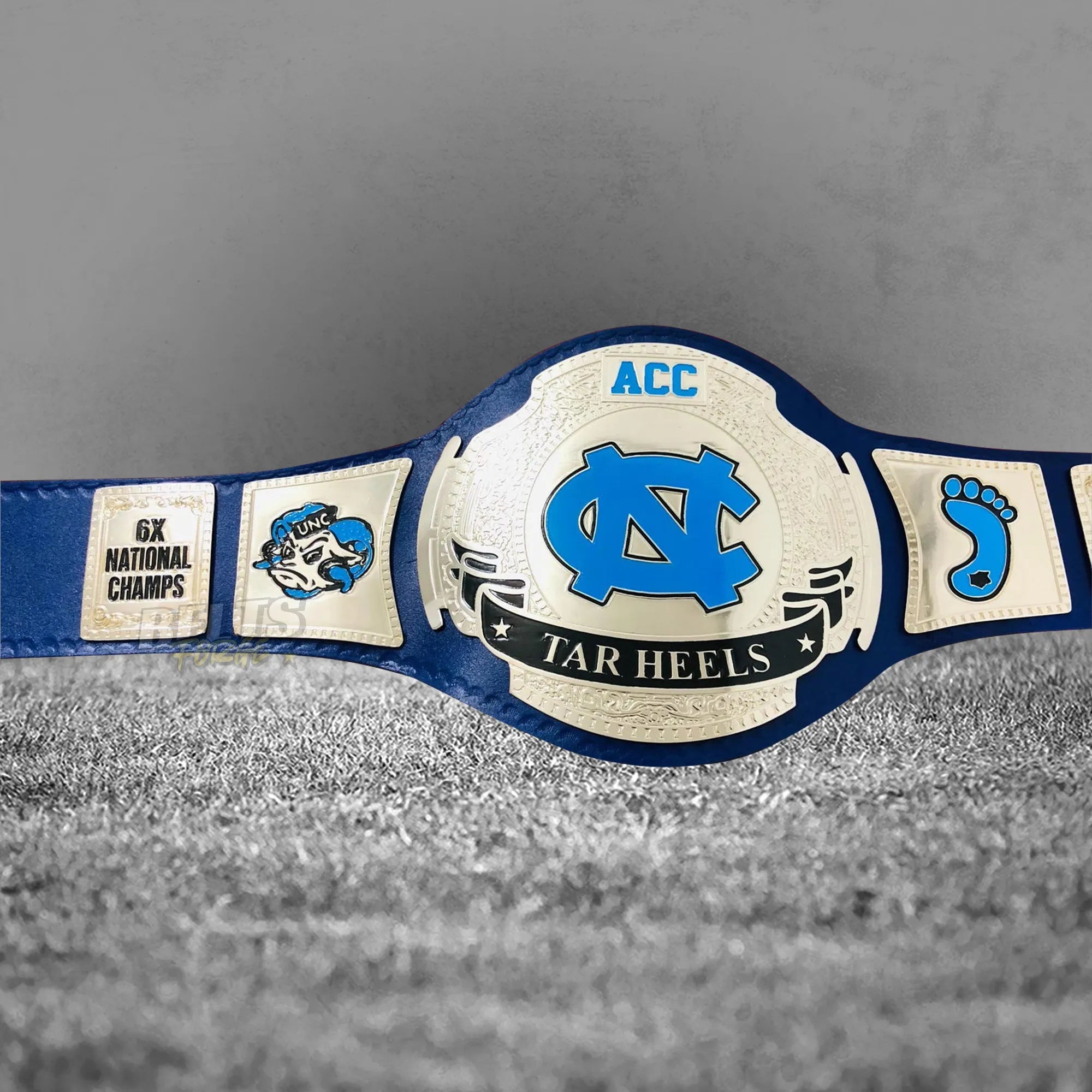UNC Tar Heels ACC Championship Belt front display view showing center and left side plates close up