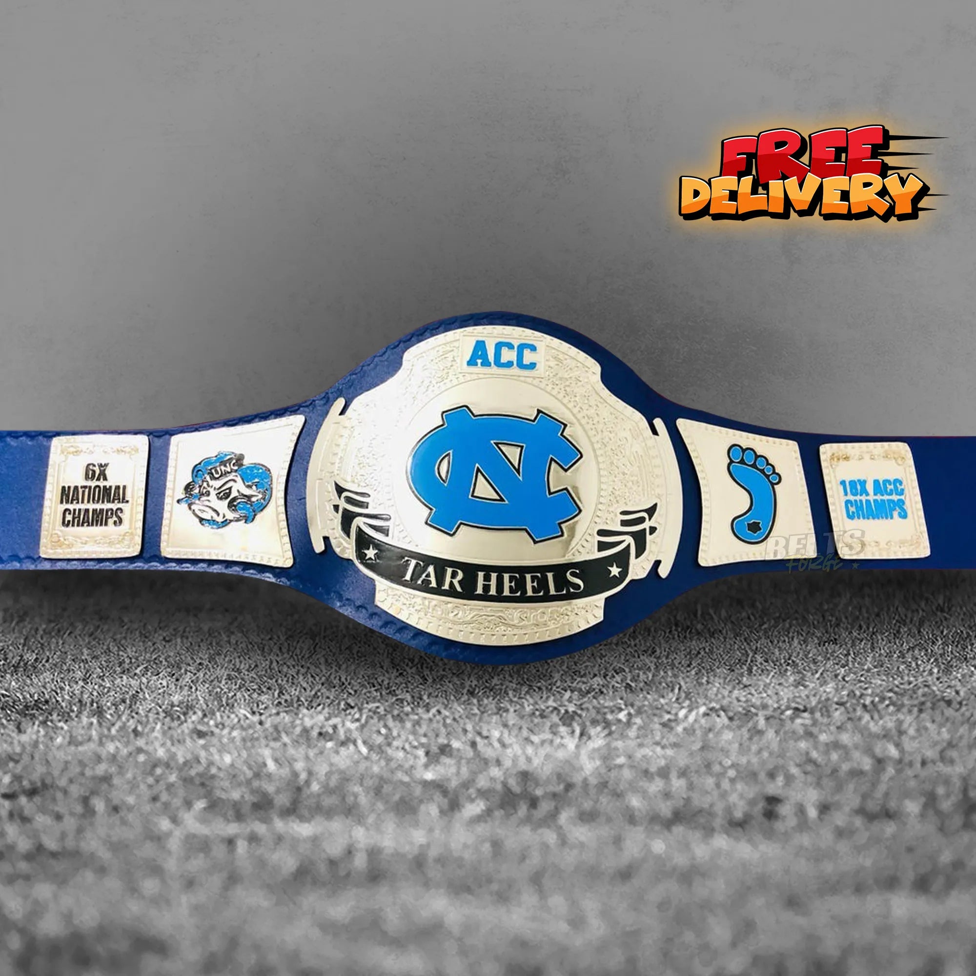UNC Tar Heels ACC Championship Belt promotional front view, gold-plated brass plates on genuine leather strap by Belts Forge
