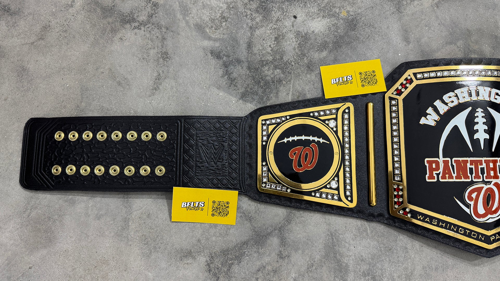 Washington Panthers JFL Football Championship Belt strap rivet and center logo detail showing gold hardware on leather strap