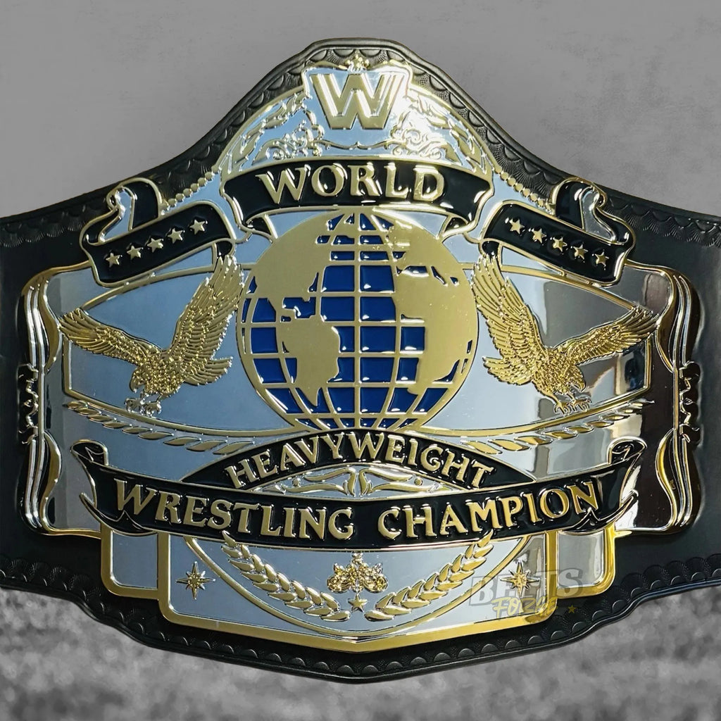 Golden Era 87 World Heavyweight Championship Belt center plate close-up showing CNC-engraved silver chrome-plated brass 1987 heavyweight design