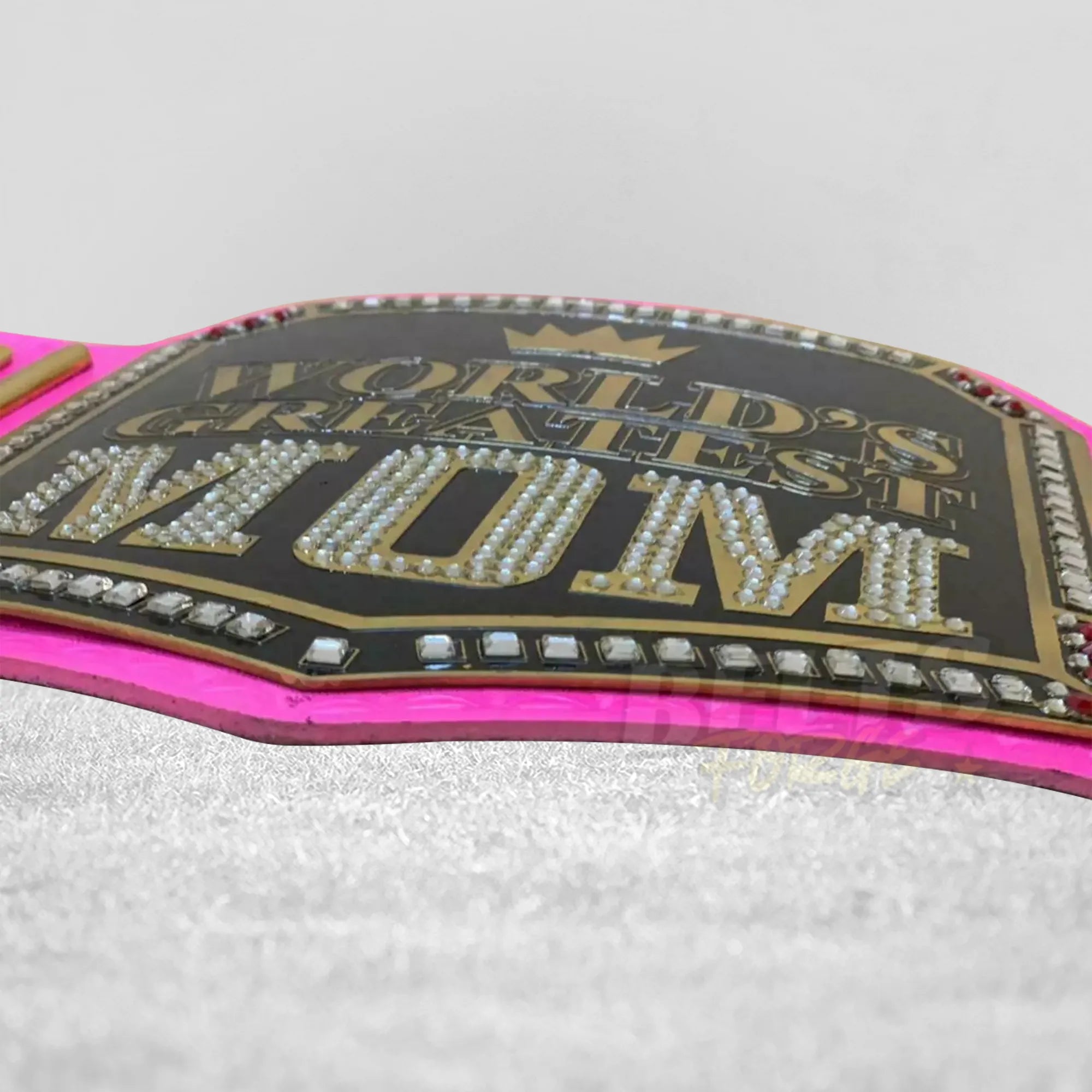 World's Greatest Mom Championship Belt strap detail showing genuine leather strap with gold hardware close-up by Belts Forge