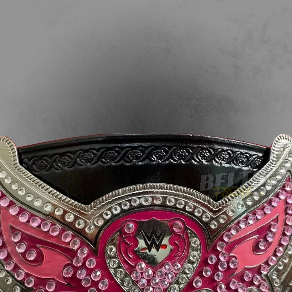 Divas Women's Championship Belt center plate rhinestone close-up showing CNC-engraved silver-plated brass plate with crystal accents