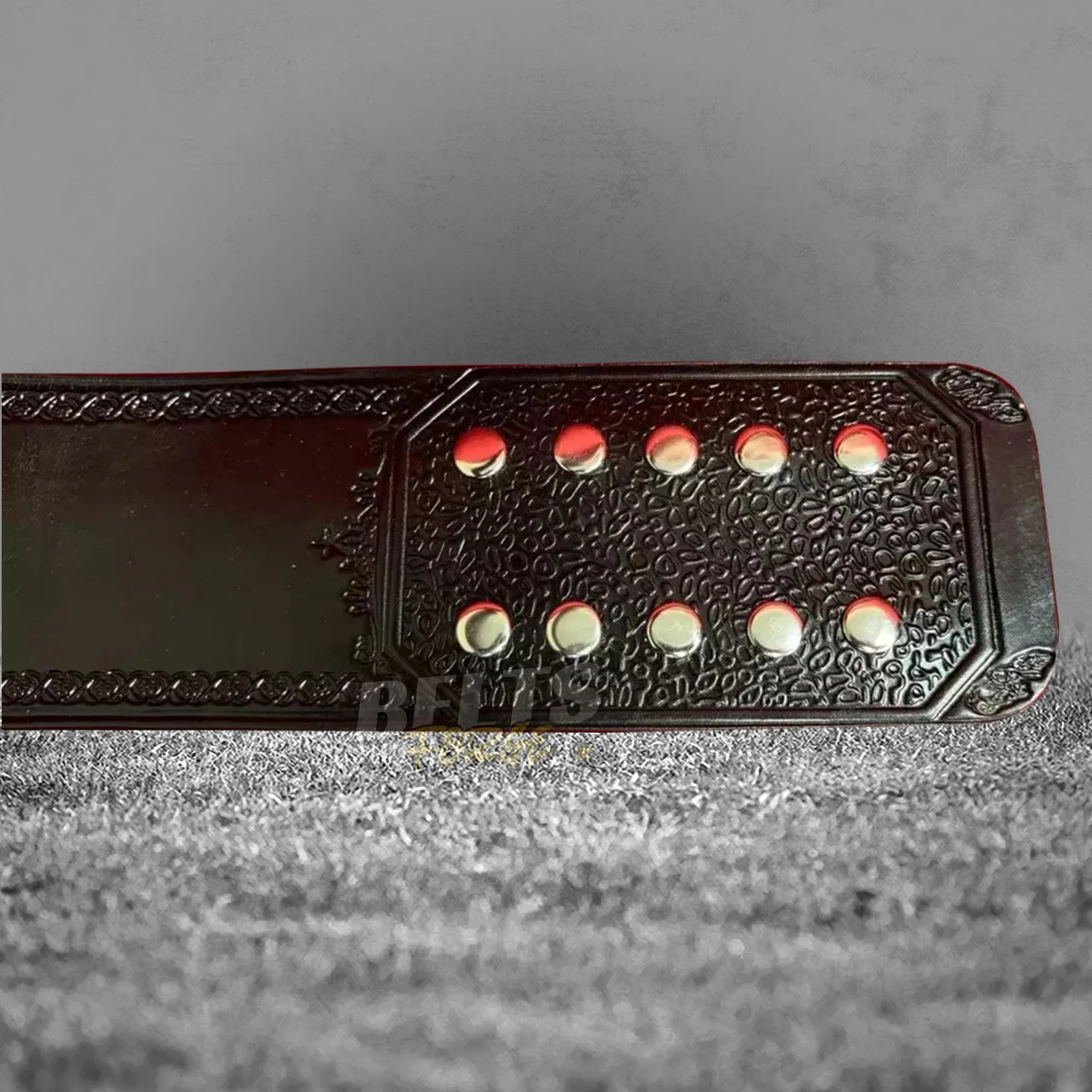 Divas Women's Championship Belt strap end stud detail showing silver hardware on genuine cowhide leather strap close-up