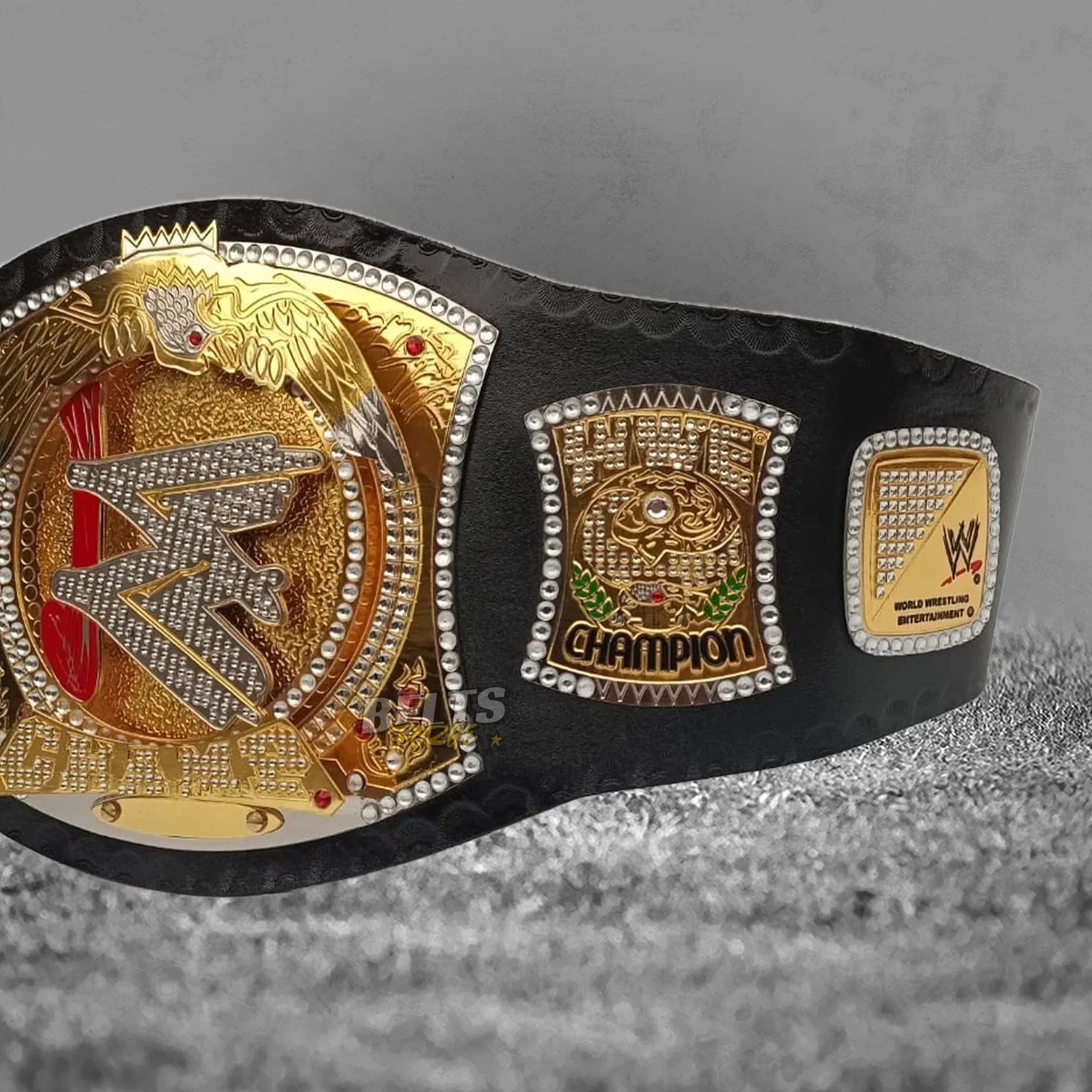 Diamond Spinner Championship Belt full overhead flat lay showing all four gold-plated brass side plates