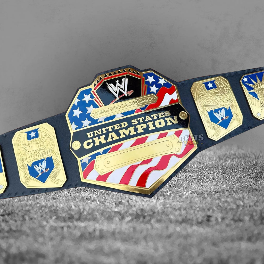 United States Championship Belt angled front view center plate close-up showing gold-plated brass US design