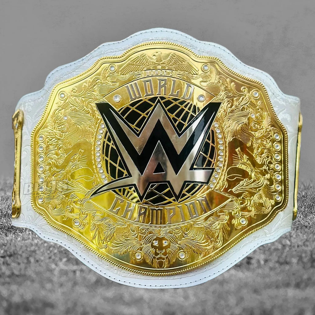 Rhea Ripley Women's World Championship Belt center plate detail showing CNC-engraved gold-plated brass championship design