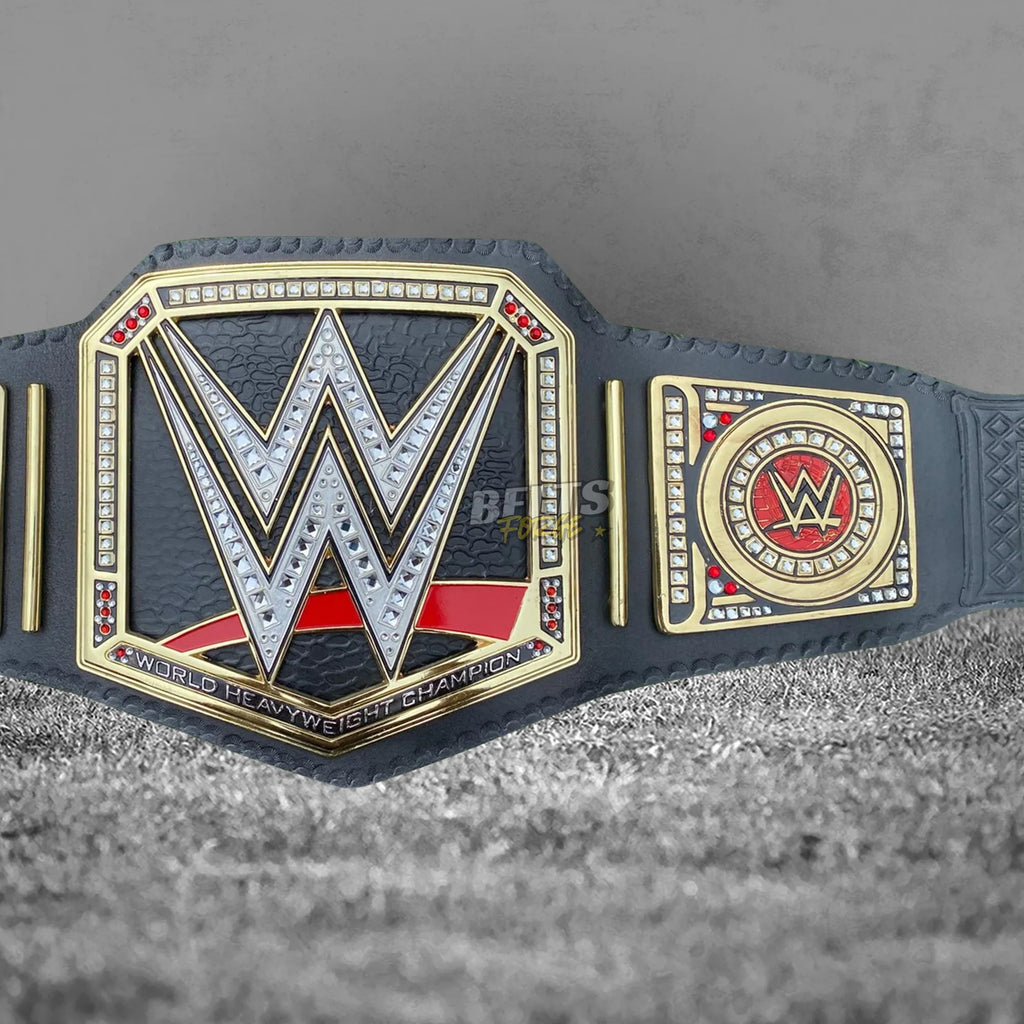 World Heavyweight Championship Belt angled front view showing solid brass center plate and right side plate detail
