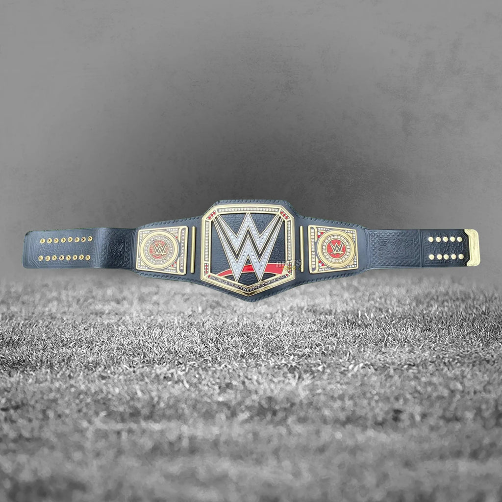 World Heavyweight Championship Belt full flat lay display view showing complete solid brass plates on leather strap