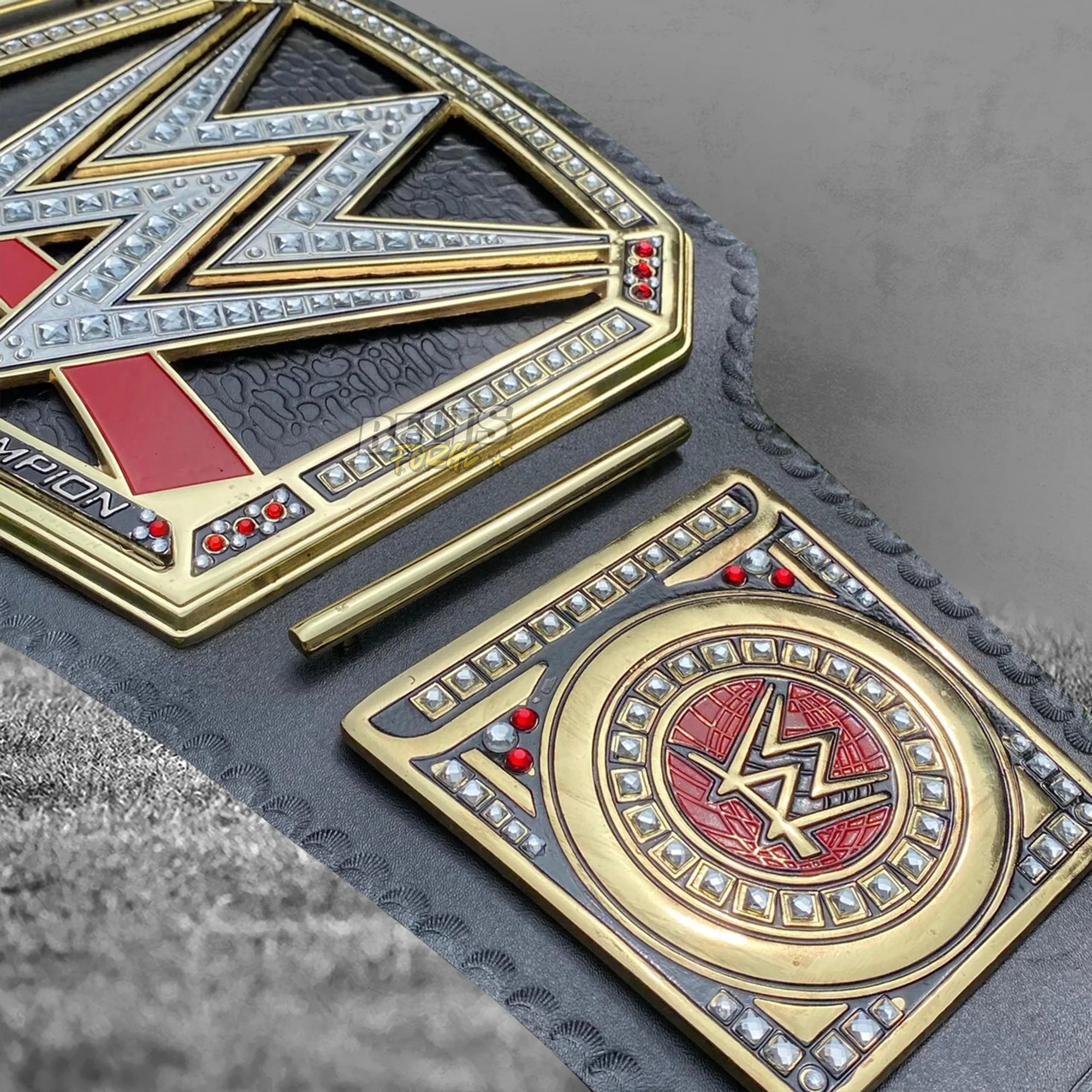 World Heavyweight Championship Belt right side plate and center plate lower angled close up on genuine leather strap