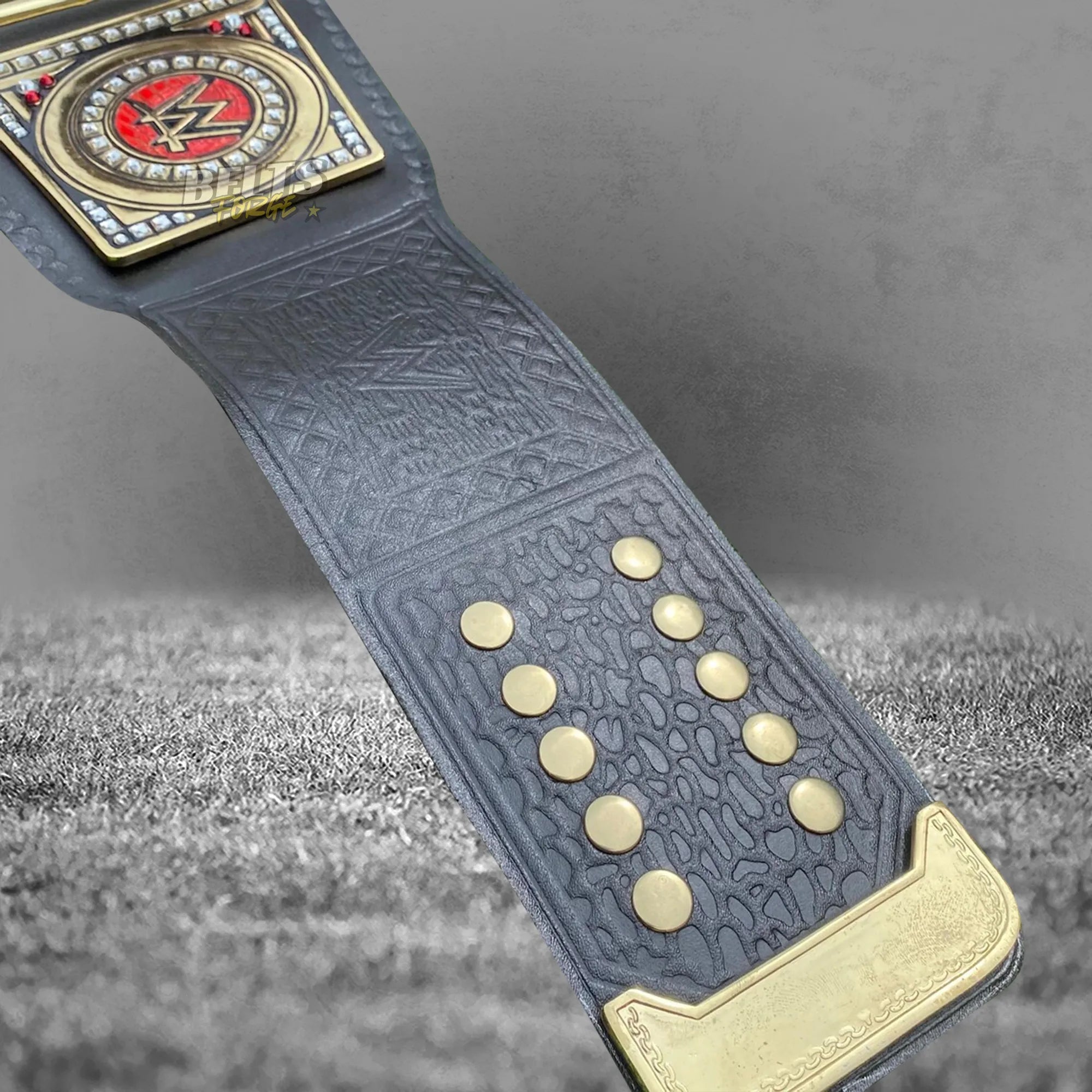 World Heavyweight Championship Belt right strap buckle end and adjustment holes detail close up