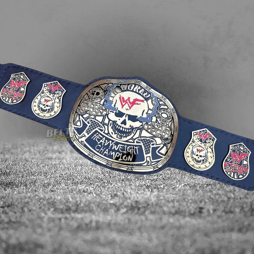 Skull Era Heavyweight Championship Belt front view angled display showing gold-plated brass skull plate on genuine leather strap