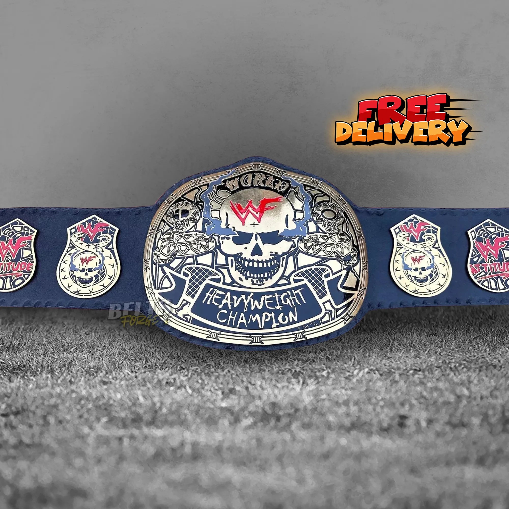 Skull Era Heavyweight Championship Belt promotional front view, gold-plated brass skull main plate on genuine black leather strap by Belts Forge